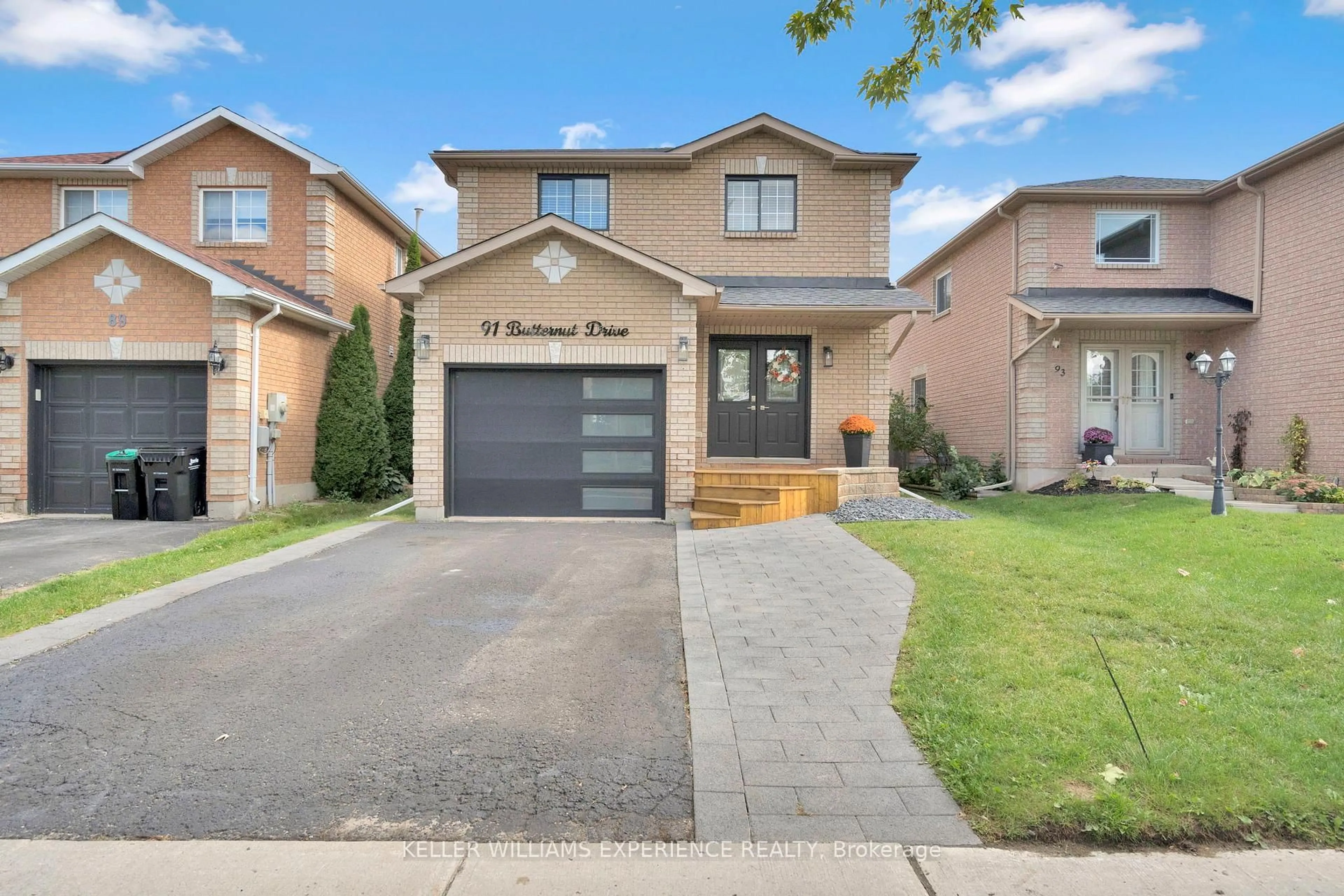 Home with brick exterior material, street for 91 Butternut Dr, Barrie Ontario L4N 9Z7