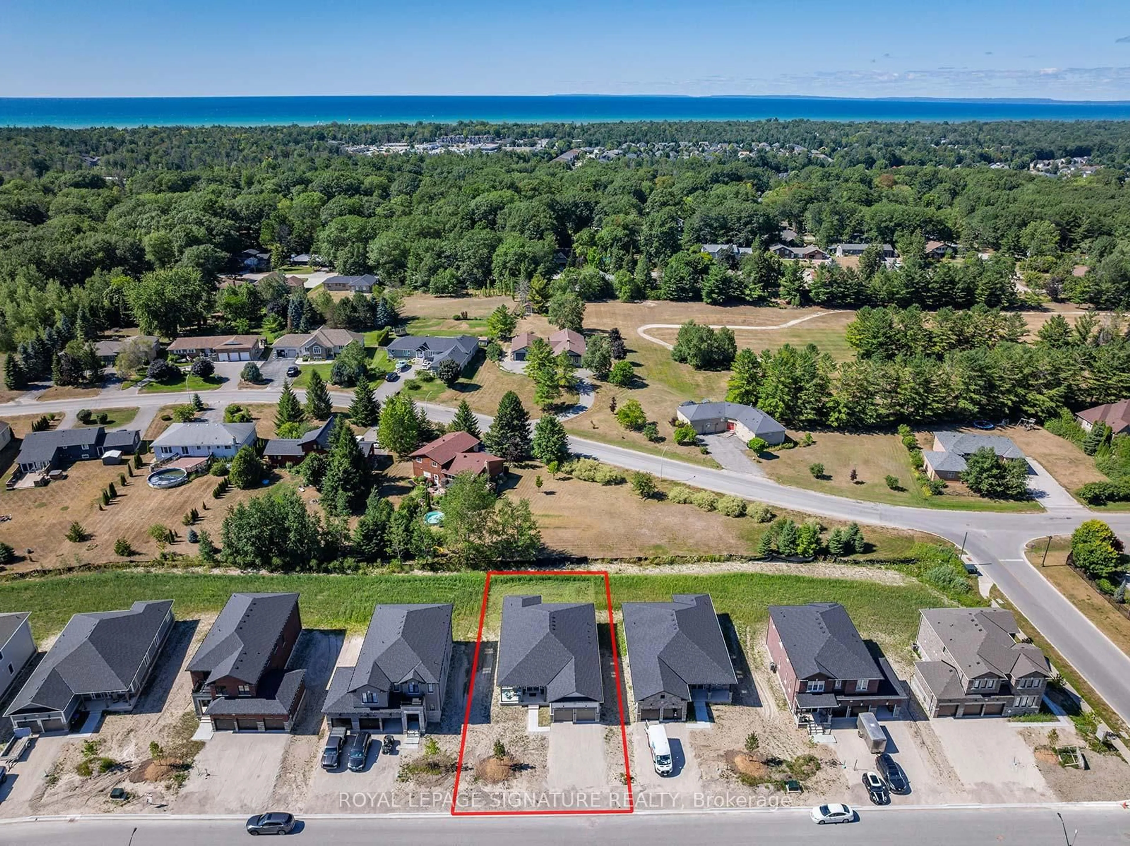 A pic from outside/outdoor area/front of a property/back of a property/a pic from drone, water/lake/river/ocean view for 8 Misty Ridge Rd, Wasaga Beach Ontario L9Z 0R8