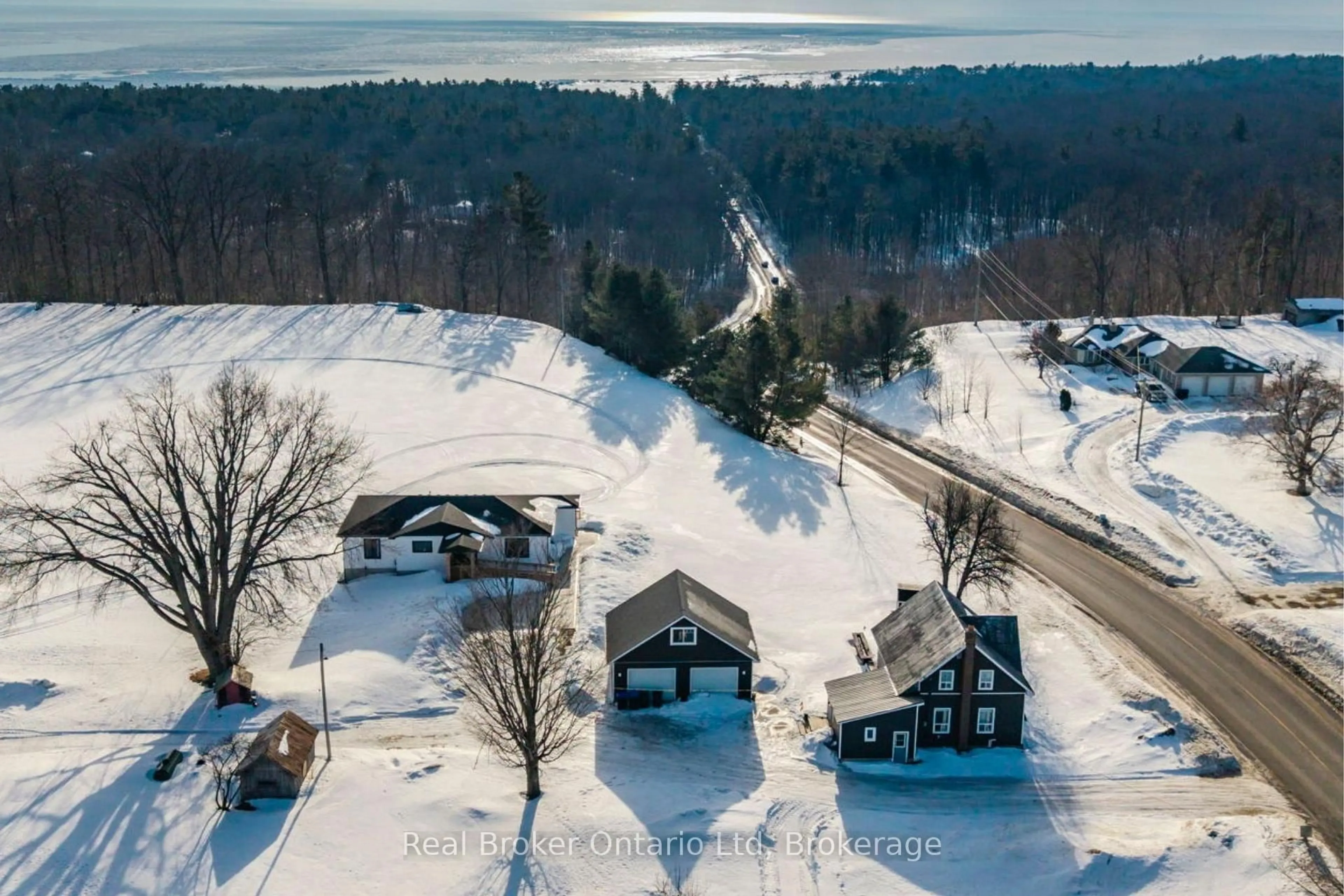 A pic from outside/outdoor area/front of a property/back of a property/a pic from drone, unknown for 597 Lafontaine  Rd, Tiny Ontario L9M 0L7