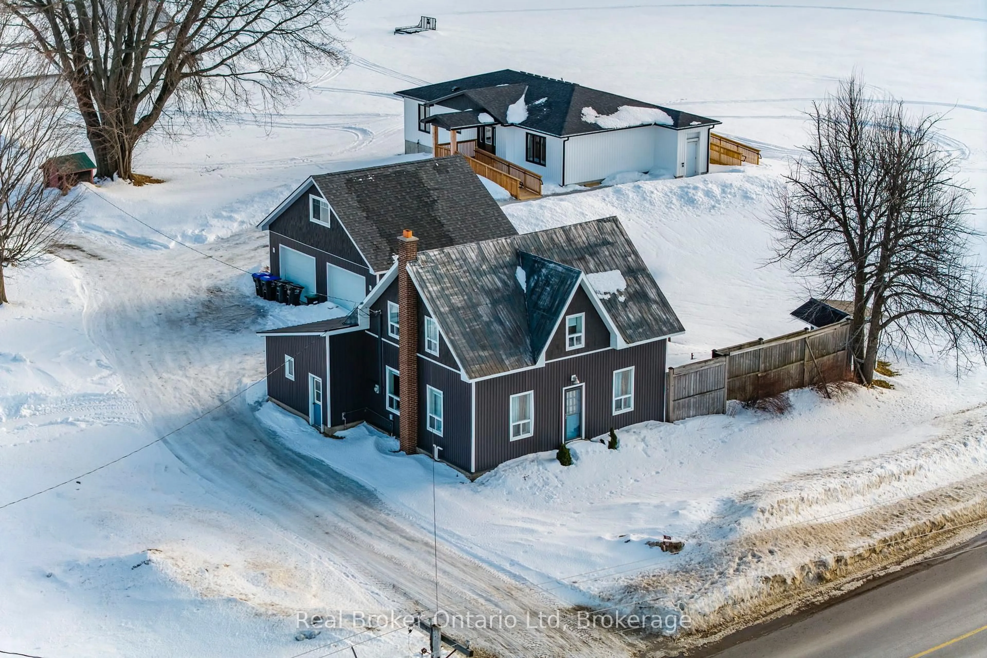 A pic from outside/outdoor area/front of a property/back of a property/a pic from drone, street for 597 Lafontaine  Rd, Tiny Ontario L9M 0L7
