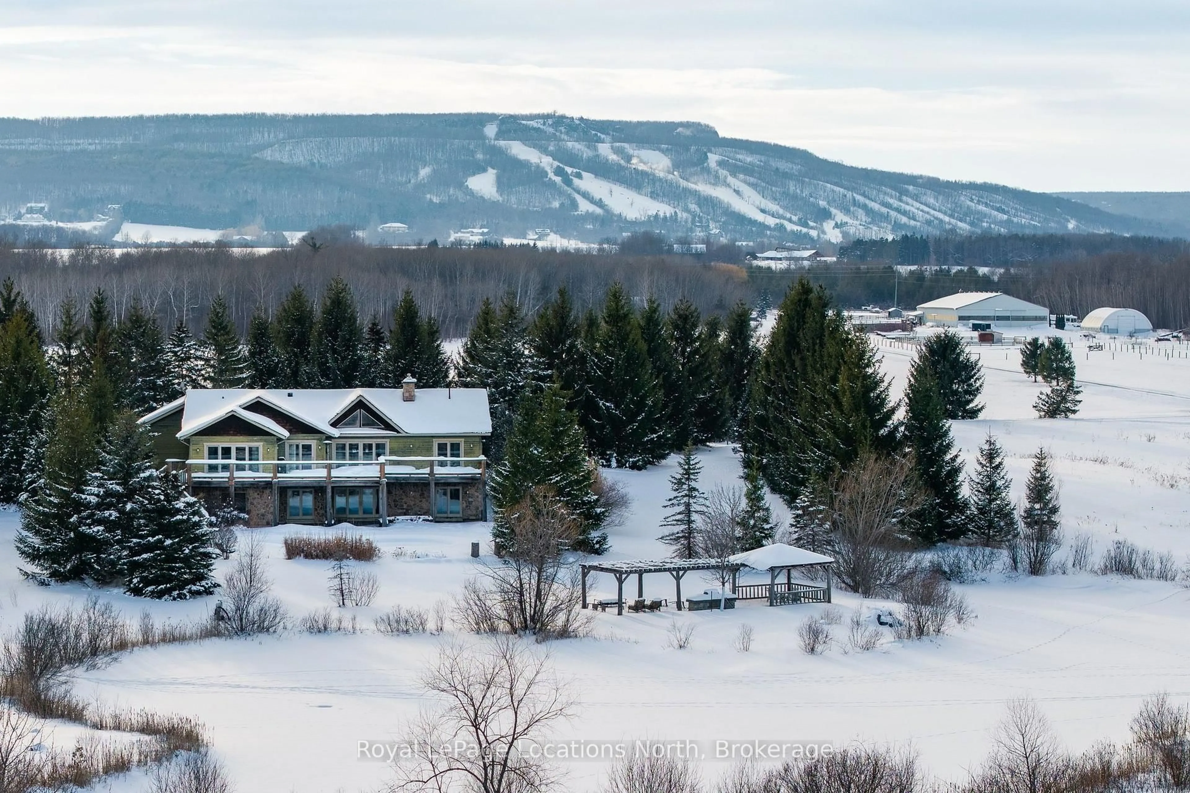 A pic from outside/outdoor area/front of a property/back of a property/a pic from drone, mountain view for 2623 Con 10 N Nottawasaga Sdrd, Clearview Ontario L9Y 3Y9