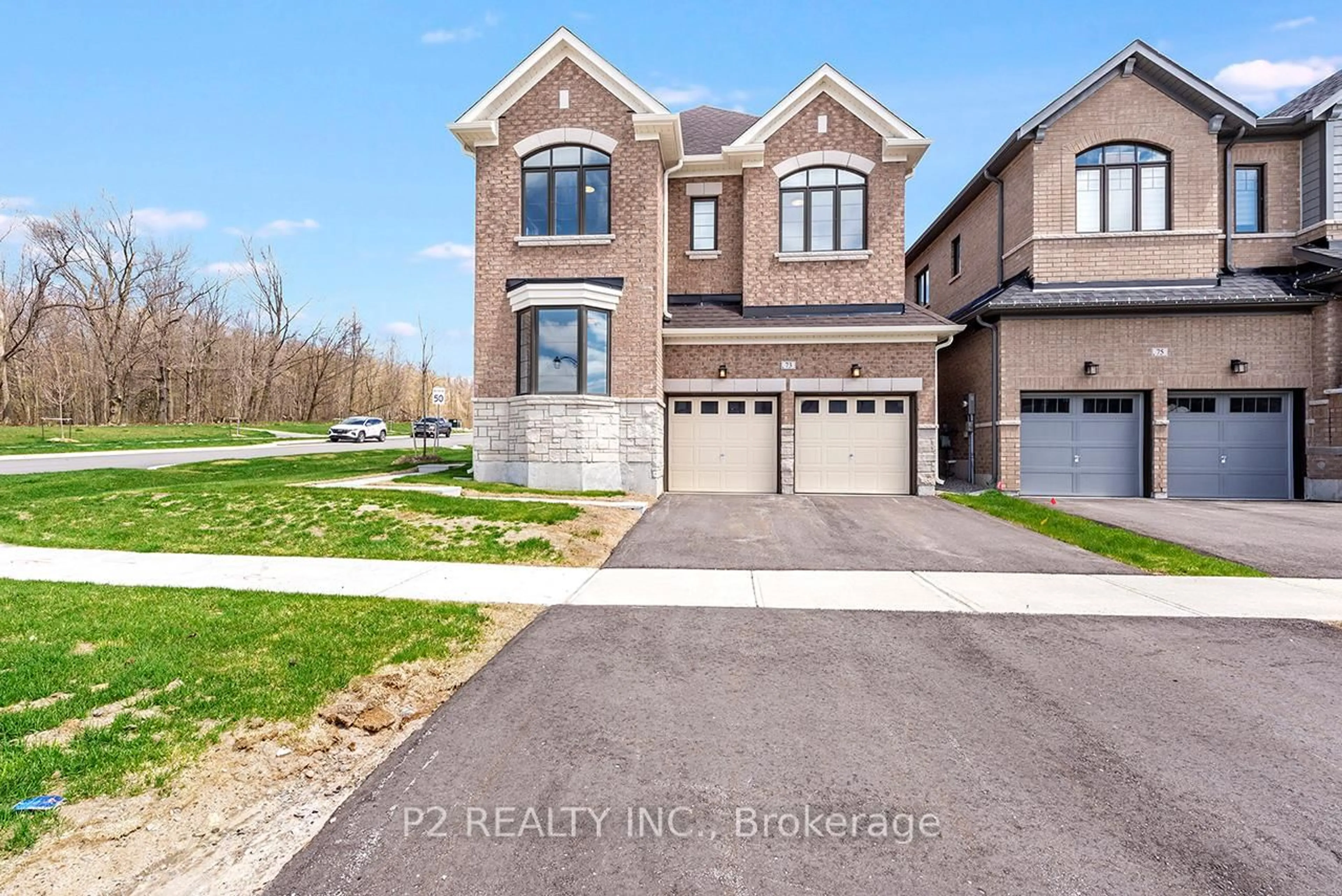 Home with brick exterior material, street for 73 Bearberry Rd, Springwater Ontario L9X 2C9