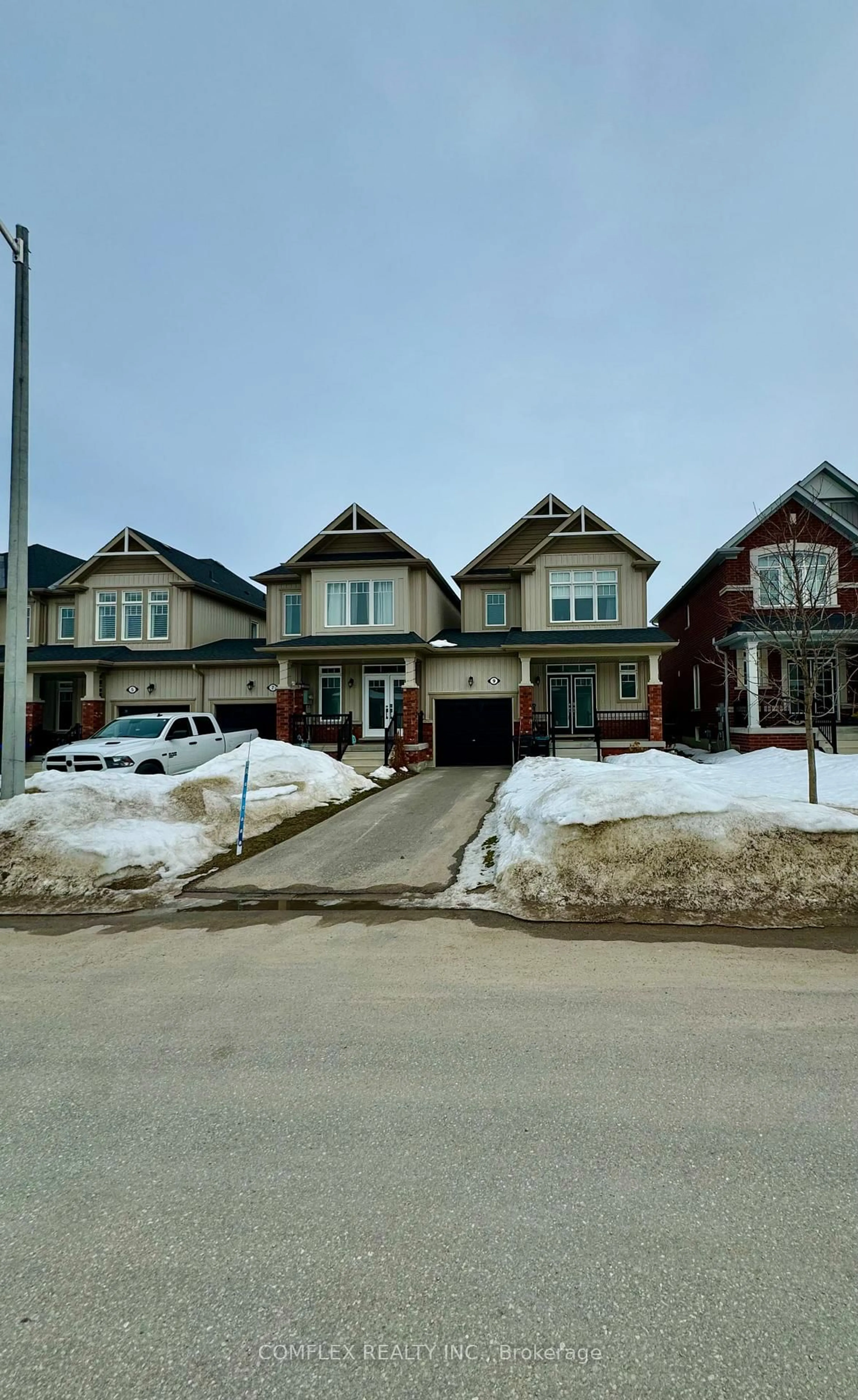 A pic from outside/outdoor area/front of a property/back of a property/a pic from drone, street for 9 BARFOOT St, Collingwood Ontario L9Y 3Y7