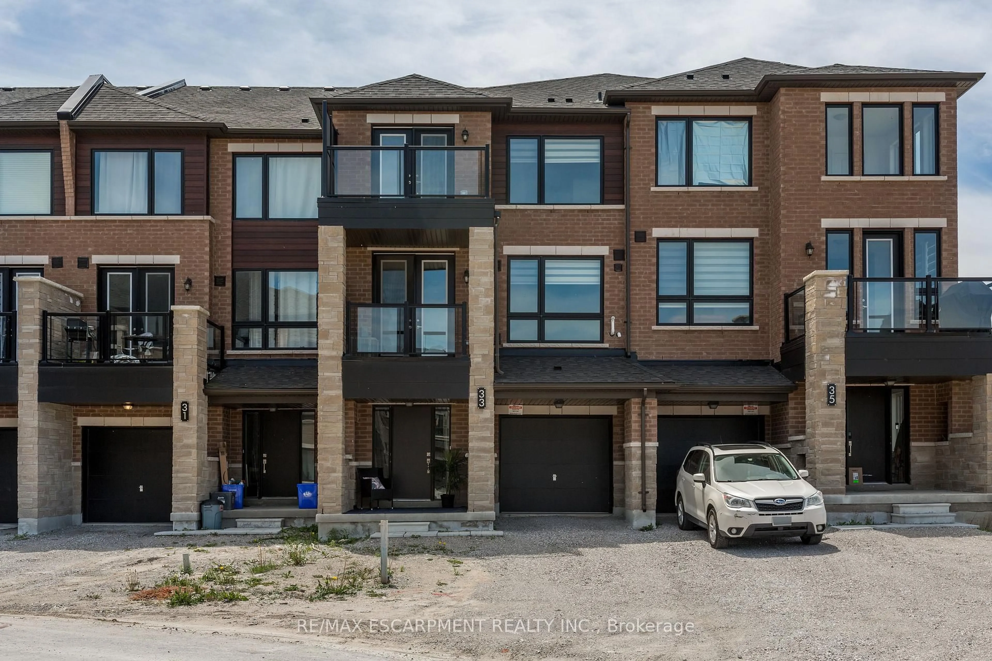 Home with brick exterior material, street for 33 Red Maple Lane, Barrie Ontario L9J 0N4