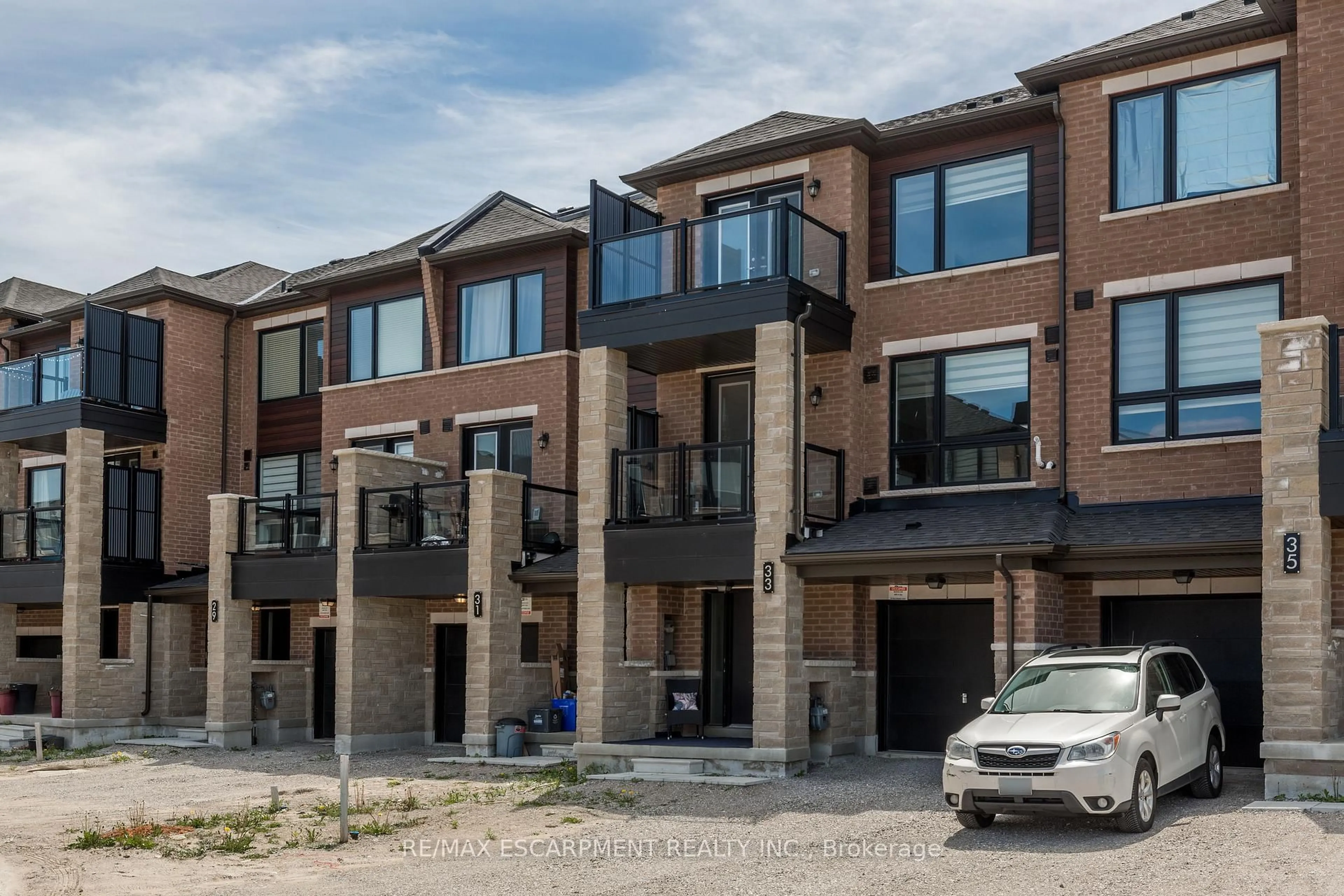 Home with brick exterior material, street for 33 Red Maple Lane, Barrie Ontario L9J 0N4