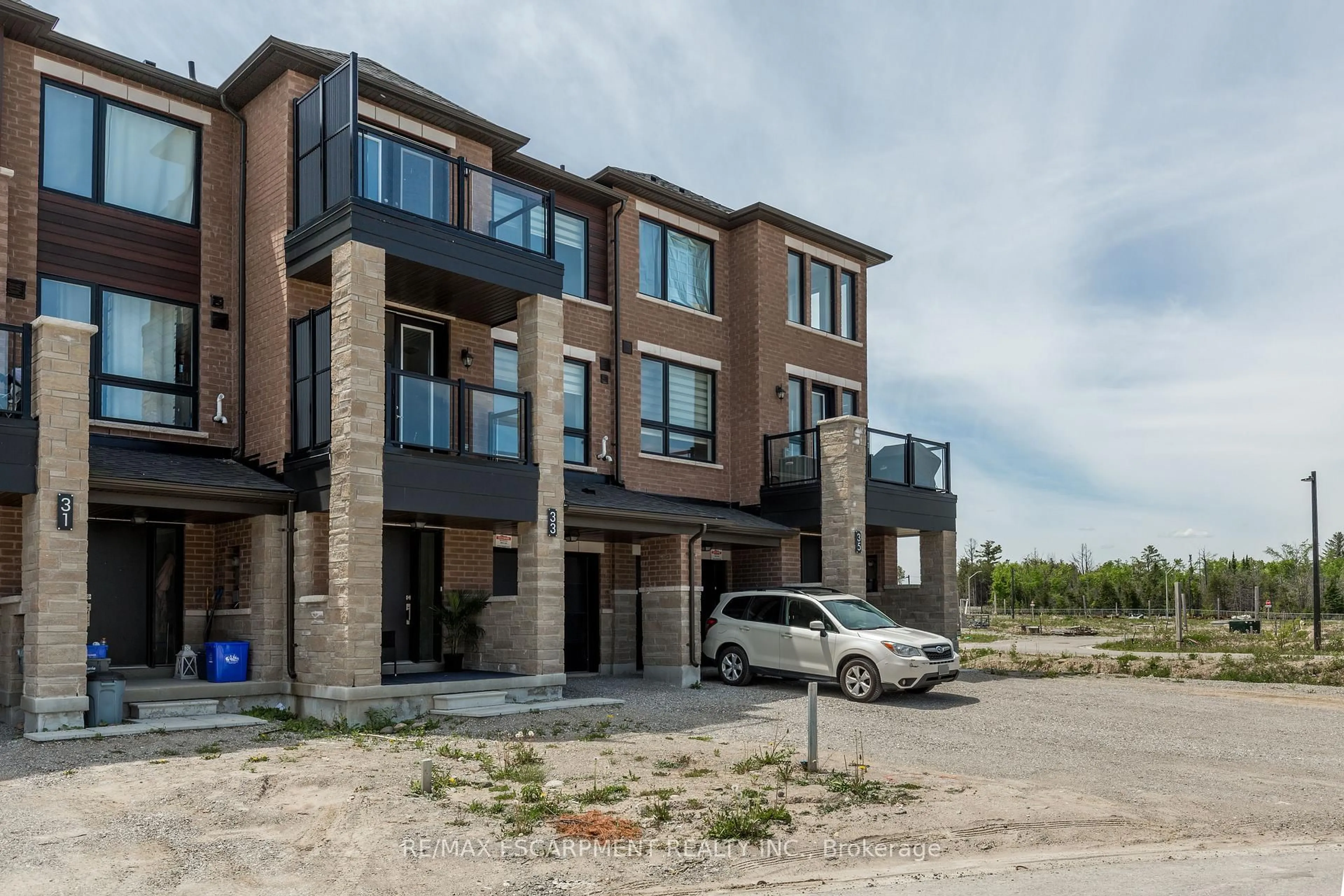 Home with brick exterior material, building for 33 Red Maple Lane, Barrie Ontario L9J 0N4