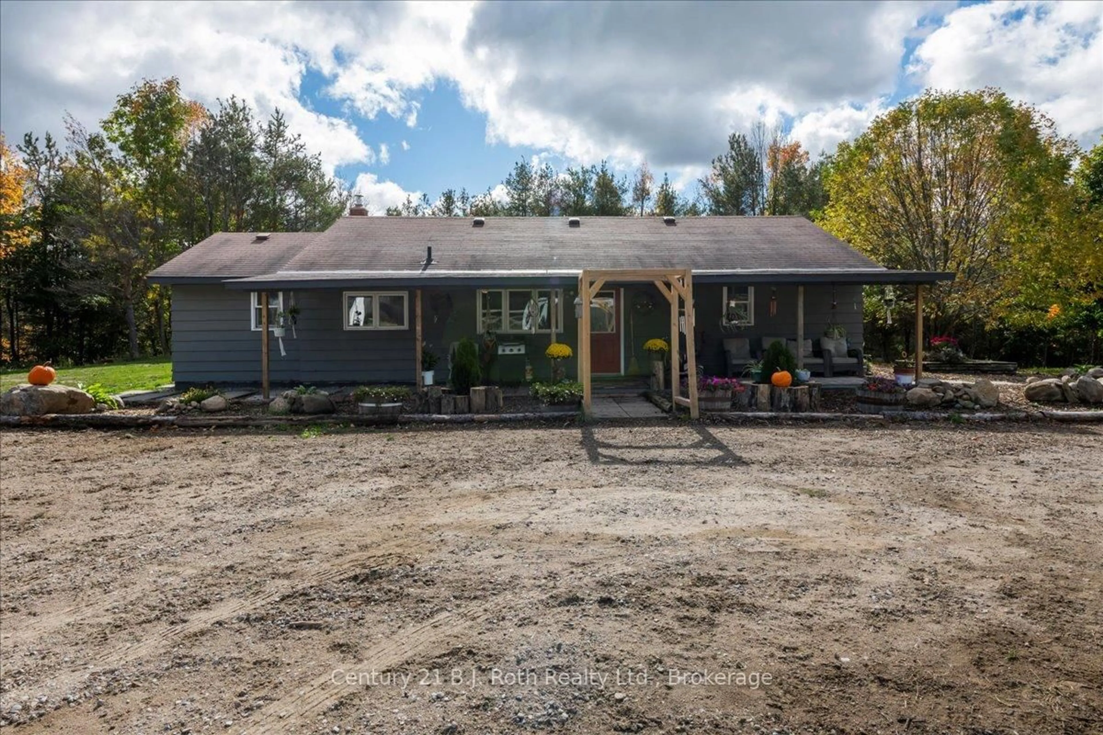 A pic from outside/outdoor area/front of a property/back of a property/a pic from drone, unknown for 2286 Flos 10 Rd, Springwater Ontario L0L 1P0