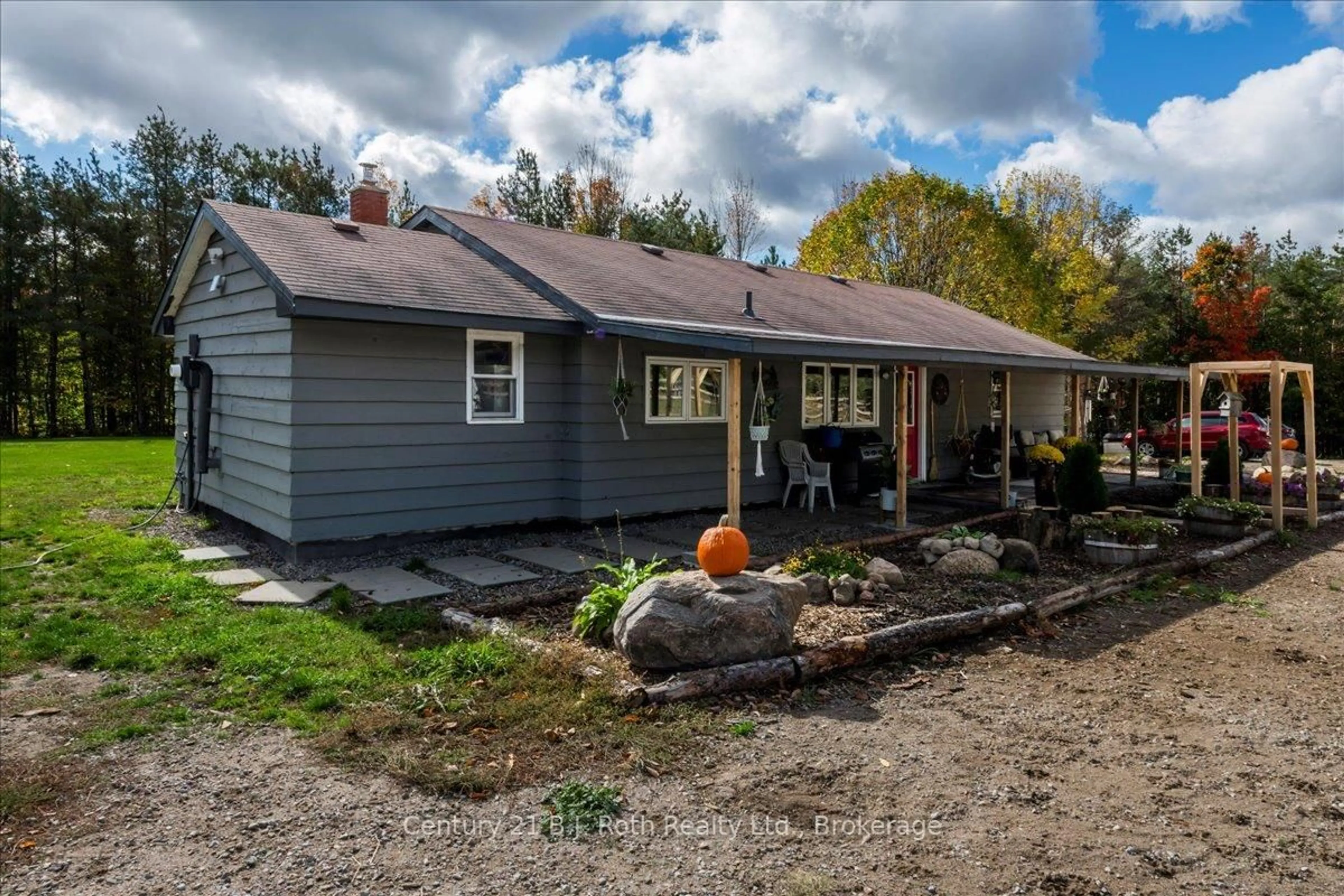 Home with vinyl exterior material, street for 2286 Flos 10 Rd, Springwater Ontario L0L 1P0