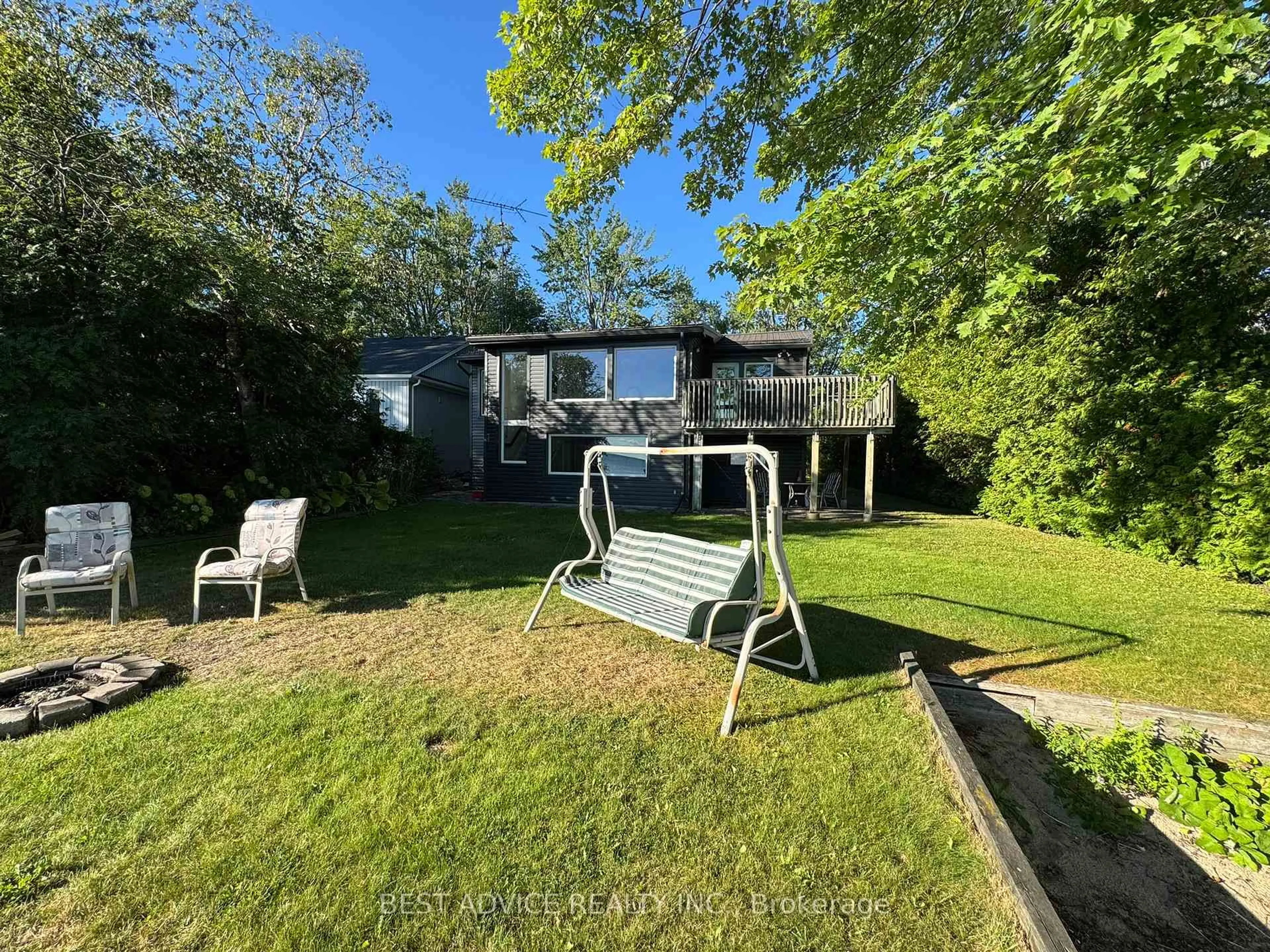 A pic from outside/outdoor area/front of a property/back of a property/a pic from drone, forest/trees view for 3794 Muley Point Lane, Ramara Ontario L3V 6H7
