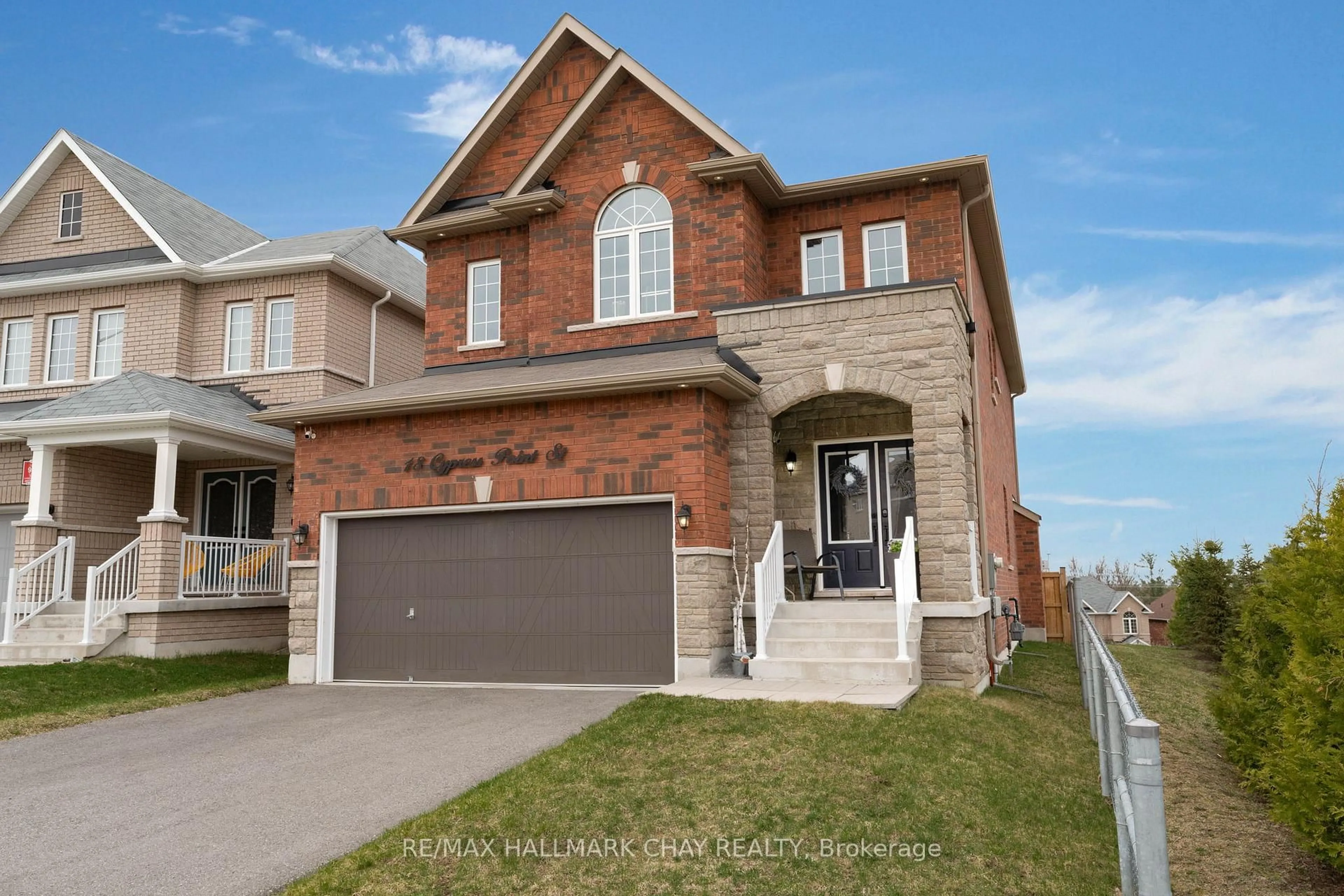 Home with brick exterior material, street for 18 Cypress Point St, Barrie Ontario L4N 6J9