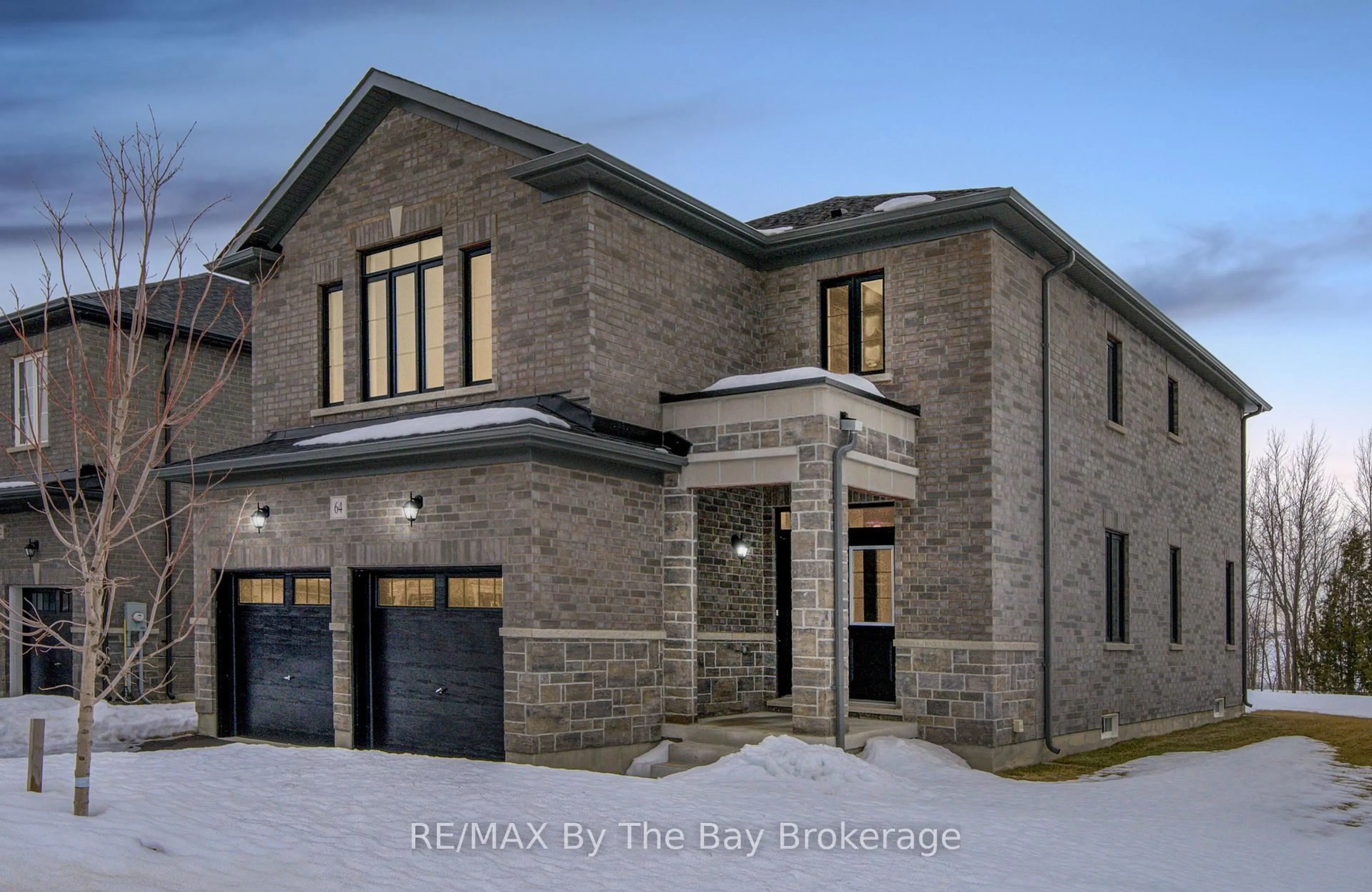 Home with brick exterior material, street for 64 Amber Dr, Wasaga Beach Ontario L9Z 0R9