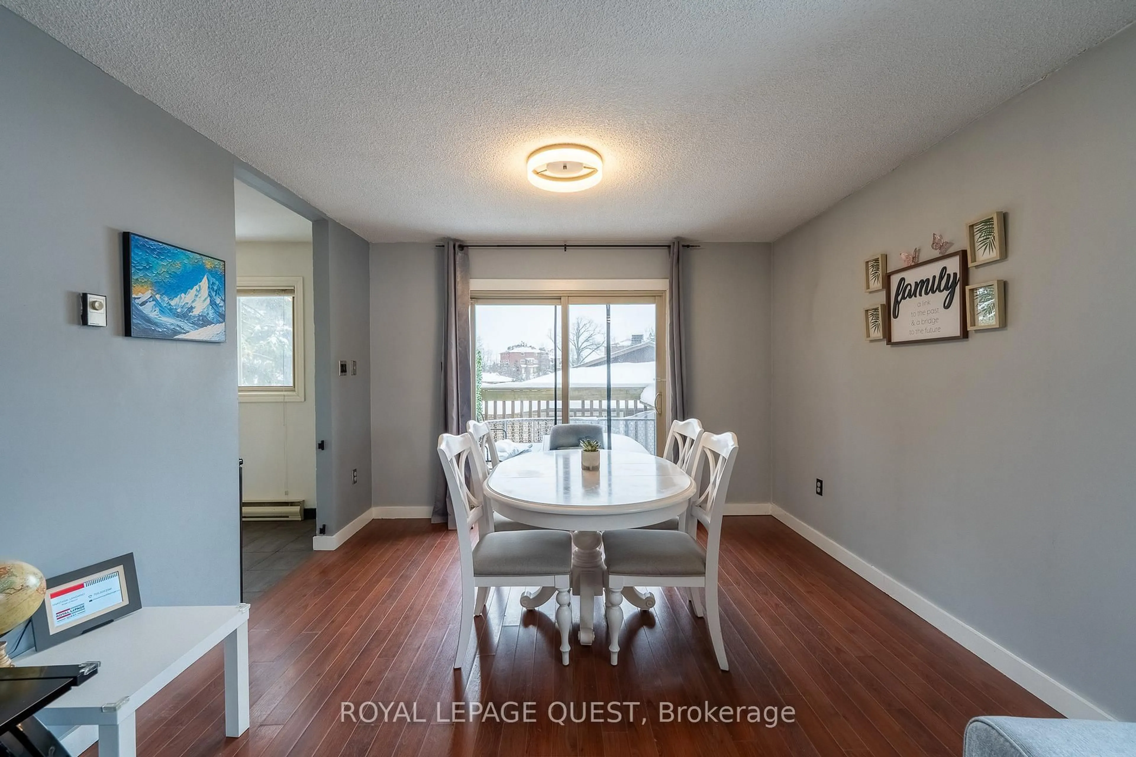 Dining room, wood/laminate floor for 23 Meadow Lane #7, Barrie Ontario L4N 7K3