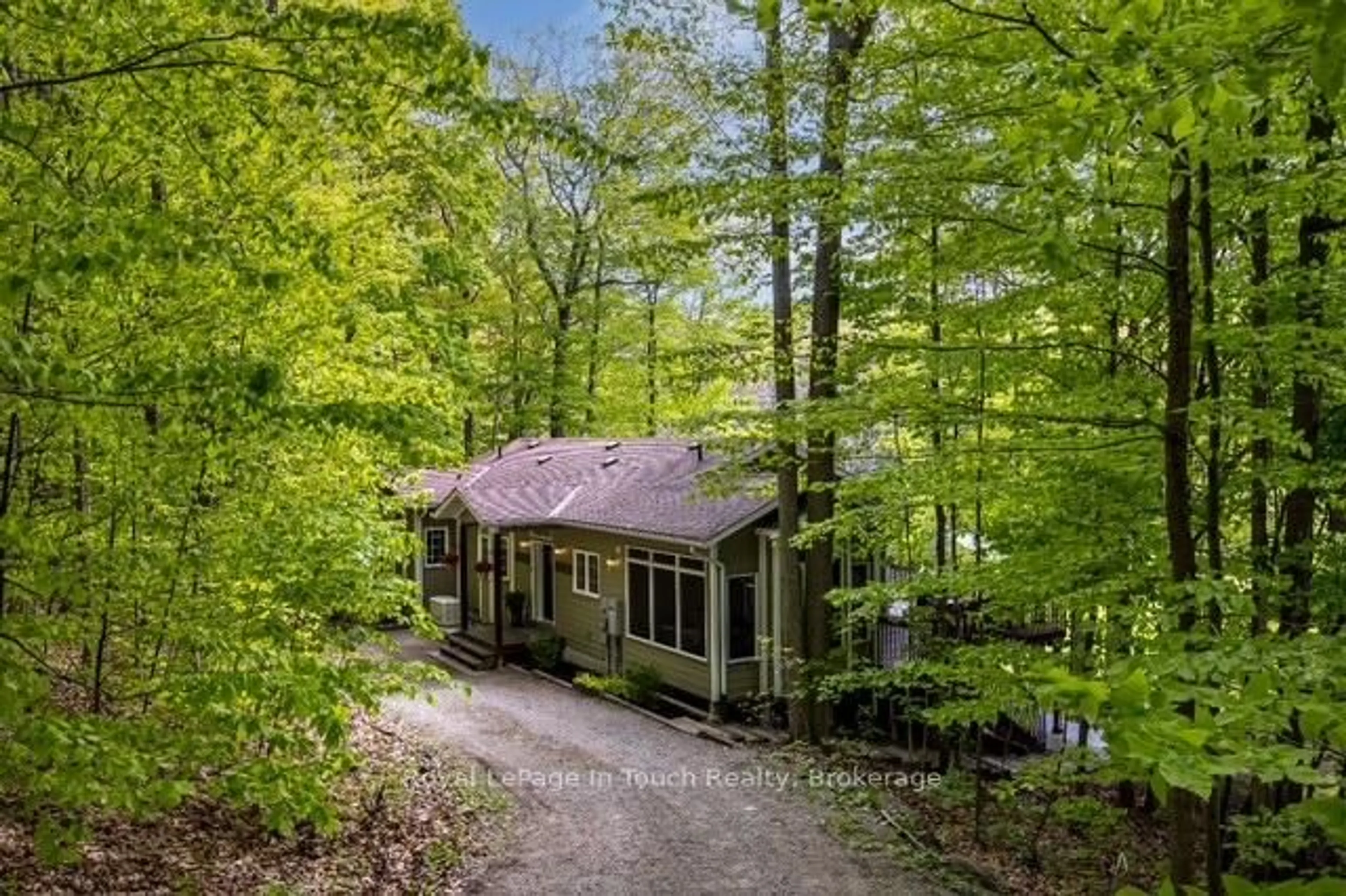 A pic from outside/outdoor area/front of a property/back of a property/a pic from drone, forest/trees view for 157 Farlain Lake Rd, Tiny Ontario L9M 0B9