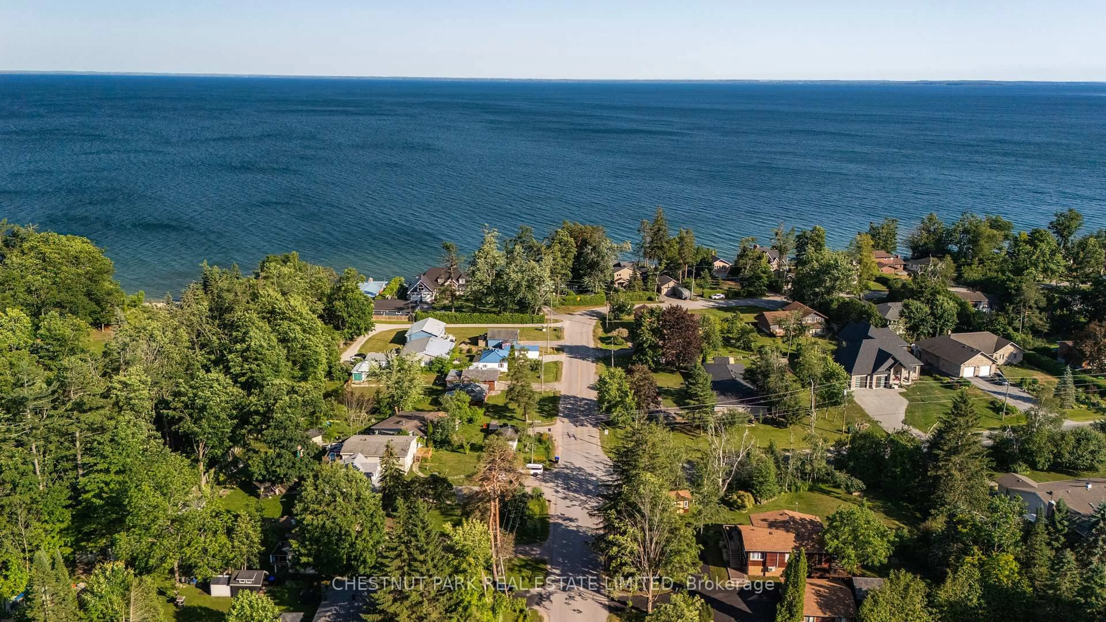 A pic from outside/outdoor area/front of a property/back of a property/a pic from drone, water/lake/river/ocean view for 47 Lakeshore Rd, Oro-Medonte Ontario L0L 2E0