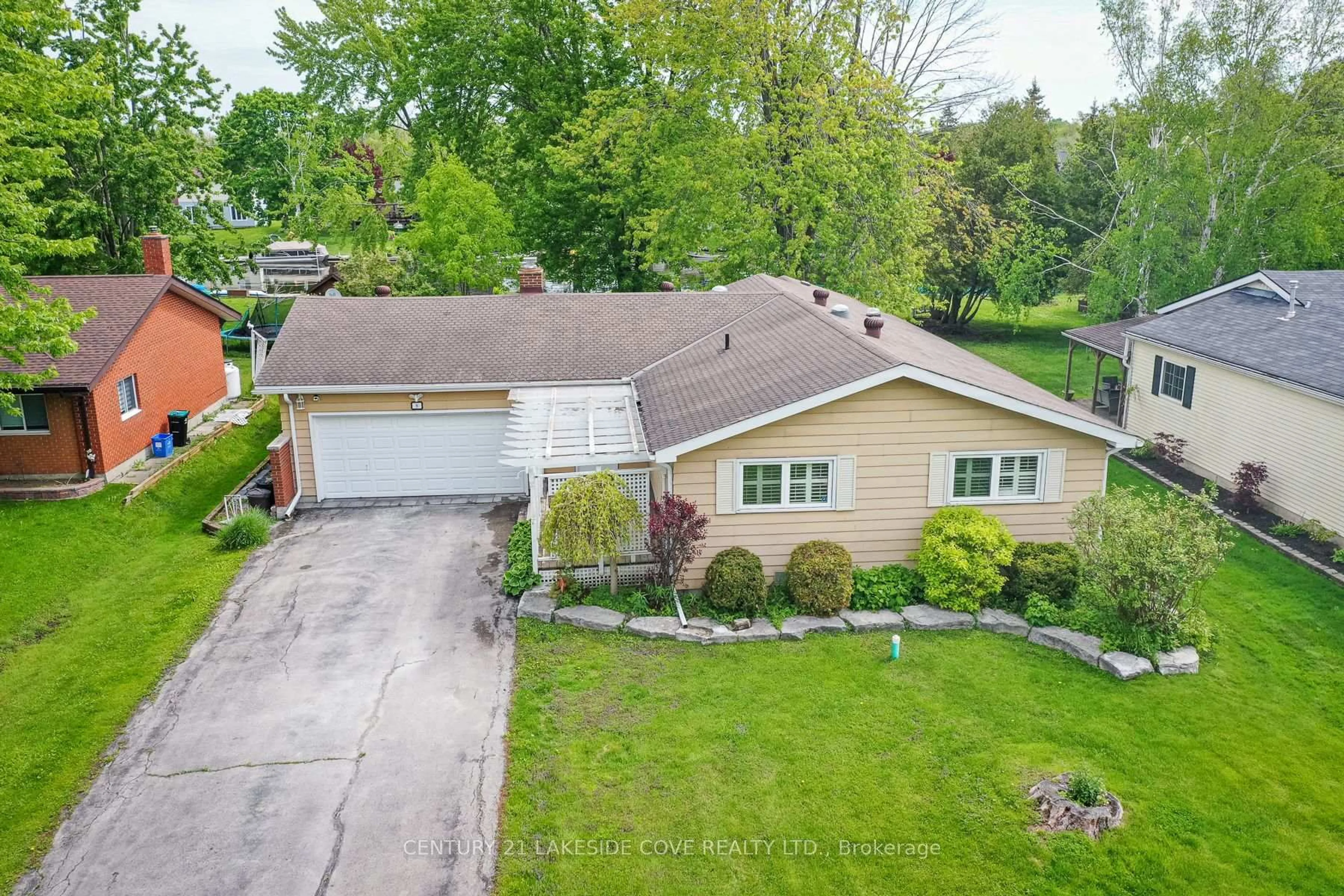 A pic from outside/outdoor area/front of a property/back of a property/a pic from drone, street for 9 Pinetree Crt, Ramara Ontario L0K 1B0