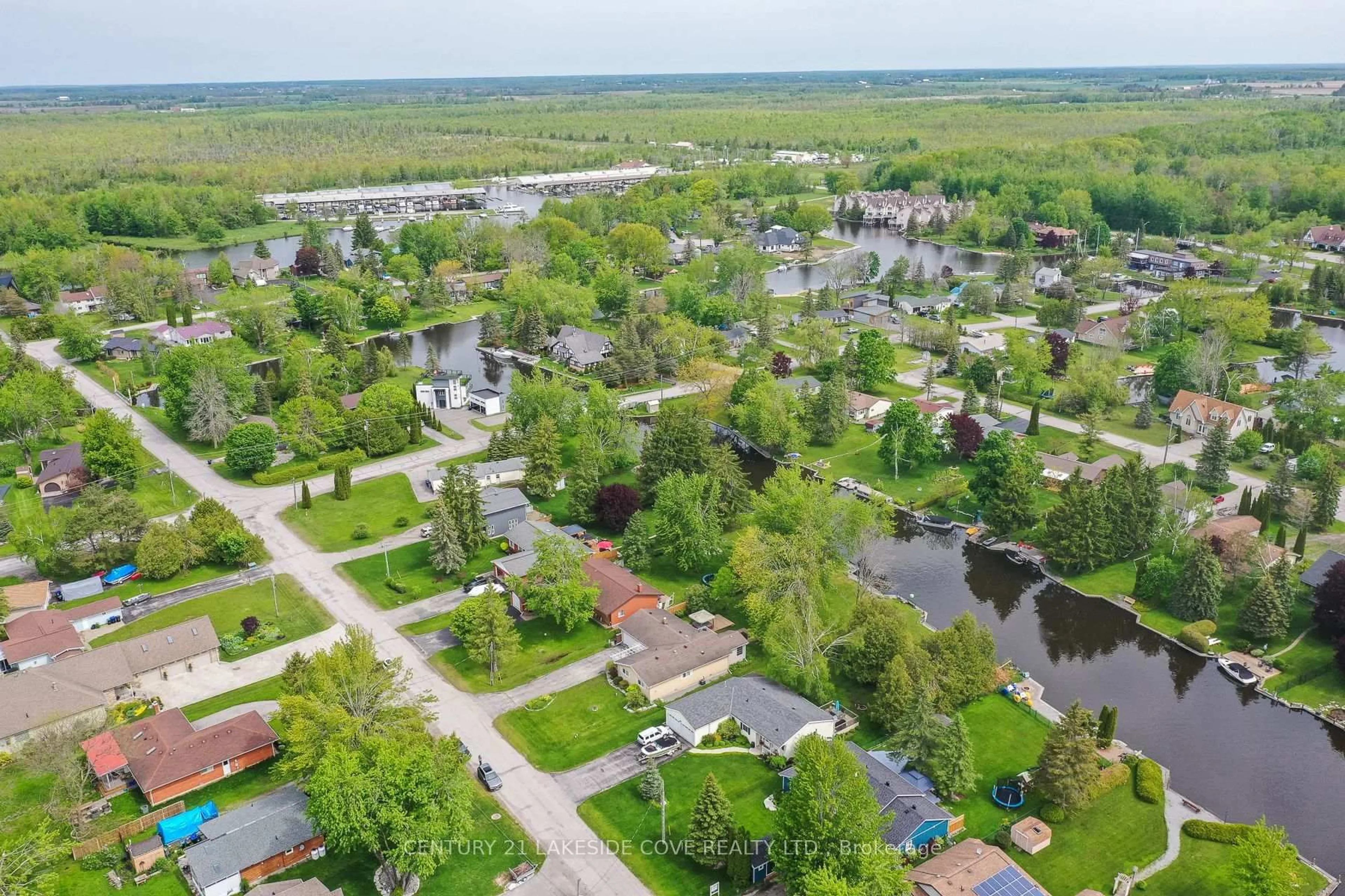 A pic from outside/outdoor area/front of a property/back of a property/a pic from drone, water/lake/river/ocean view for 9 Pinetree Crt, Ramara Ontario L0K 1B0