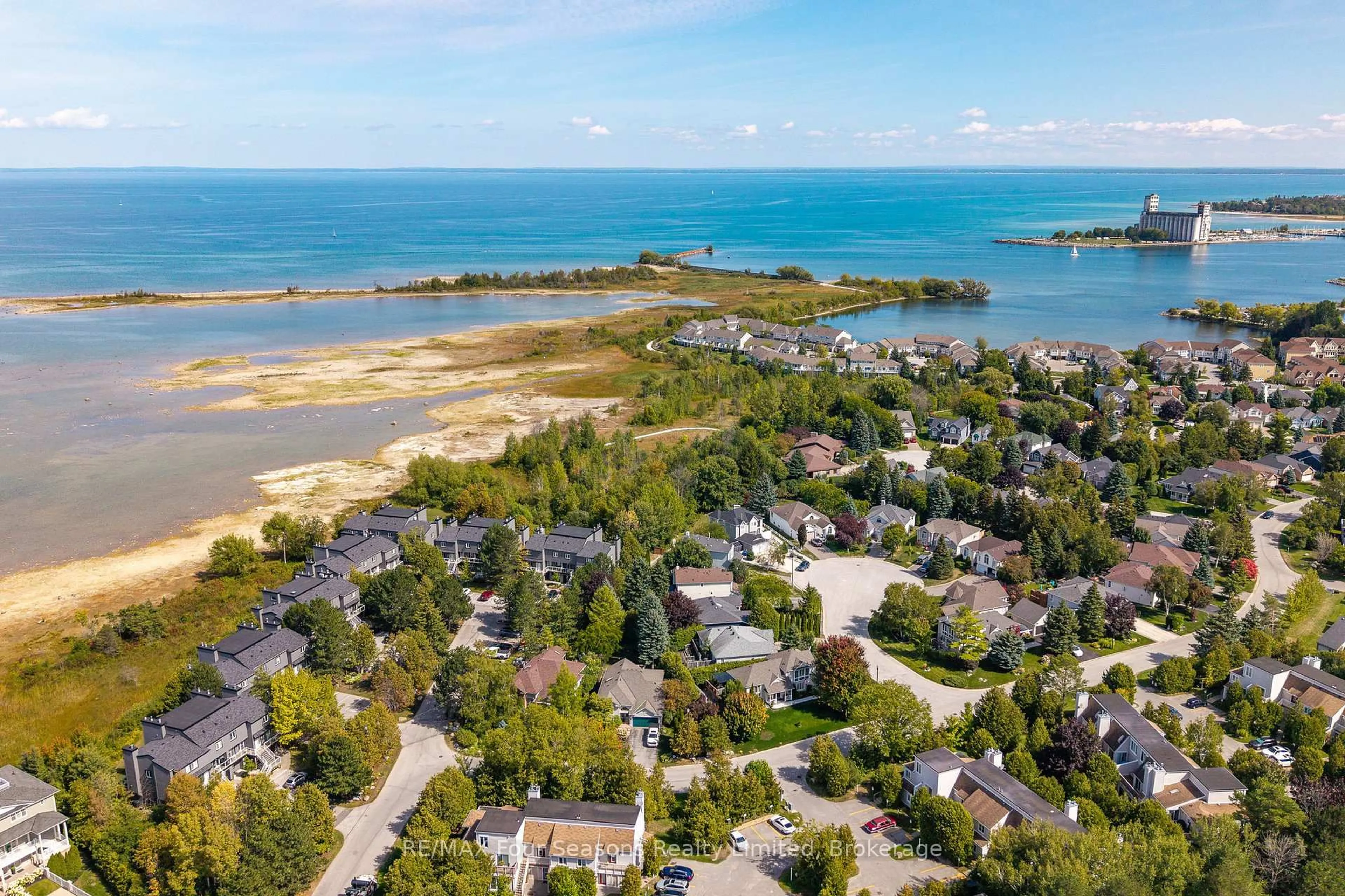 A pic from outside/outdoor area/front of a property/back of a property/a pic from drone, water/lake/river/ocean view for 44 Trott Blvd #17, Collingwood Ontario L9Y 5B7