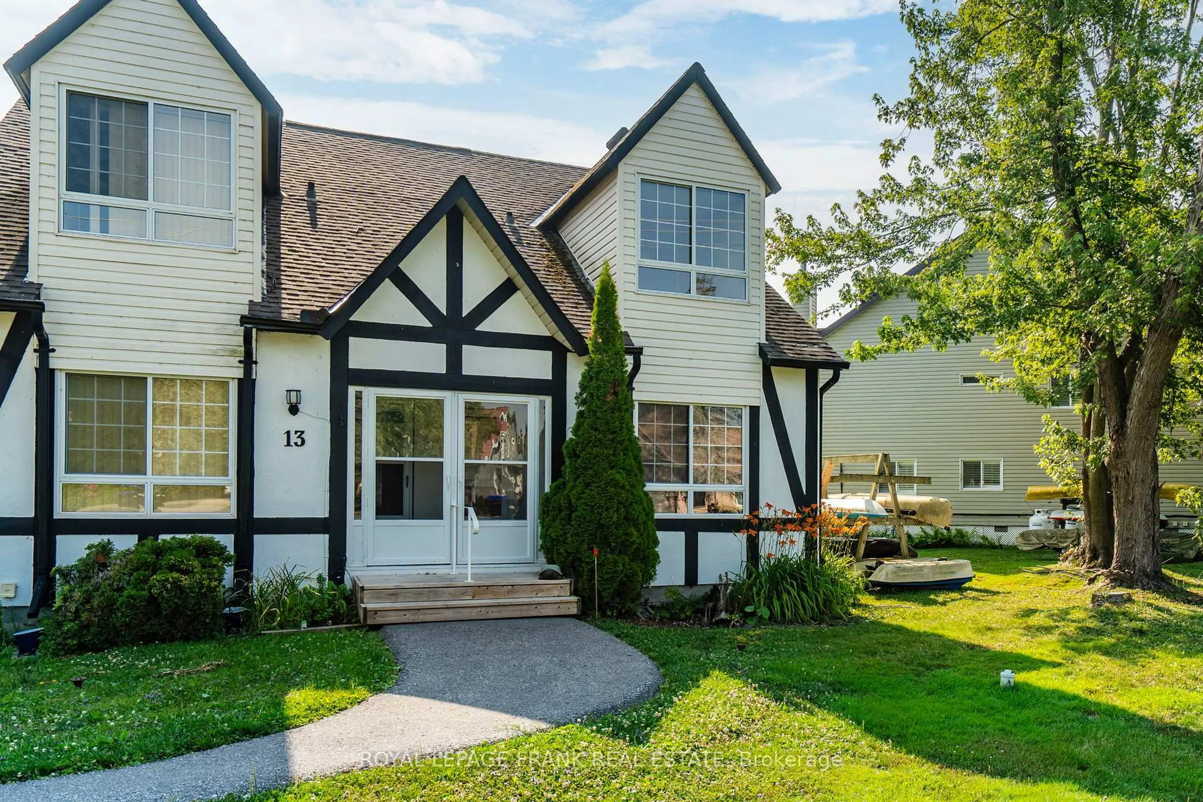 Home with vinyl exterior material, street for 81 Laguna Pkwy #14, Ramara Ontario L0K 1B0