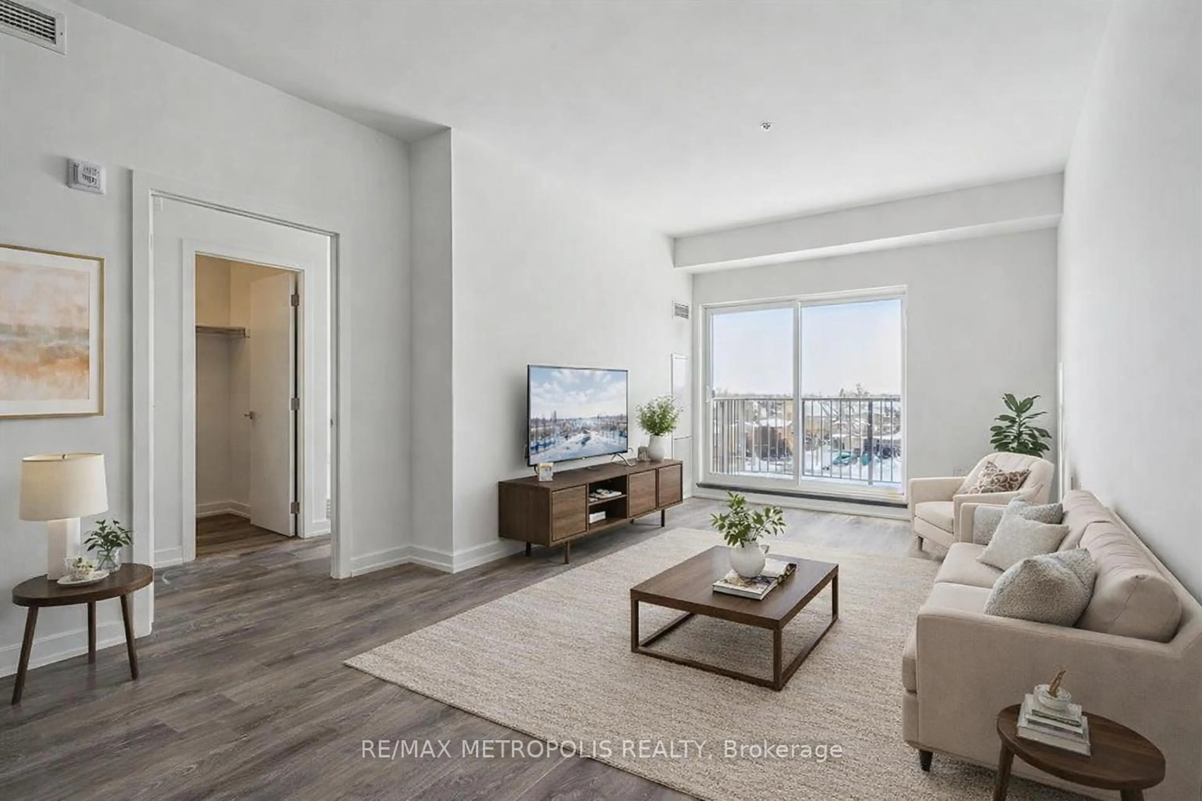 Living room with furniture, unknown for 430 Essa Rd #422, Barrie Ontario L9J 0M1