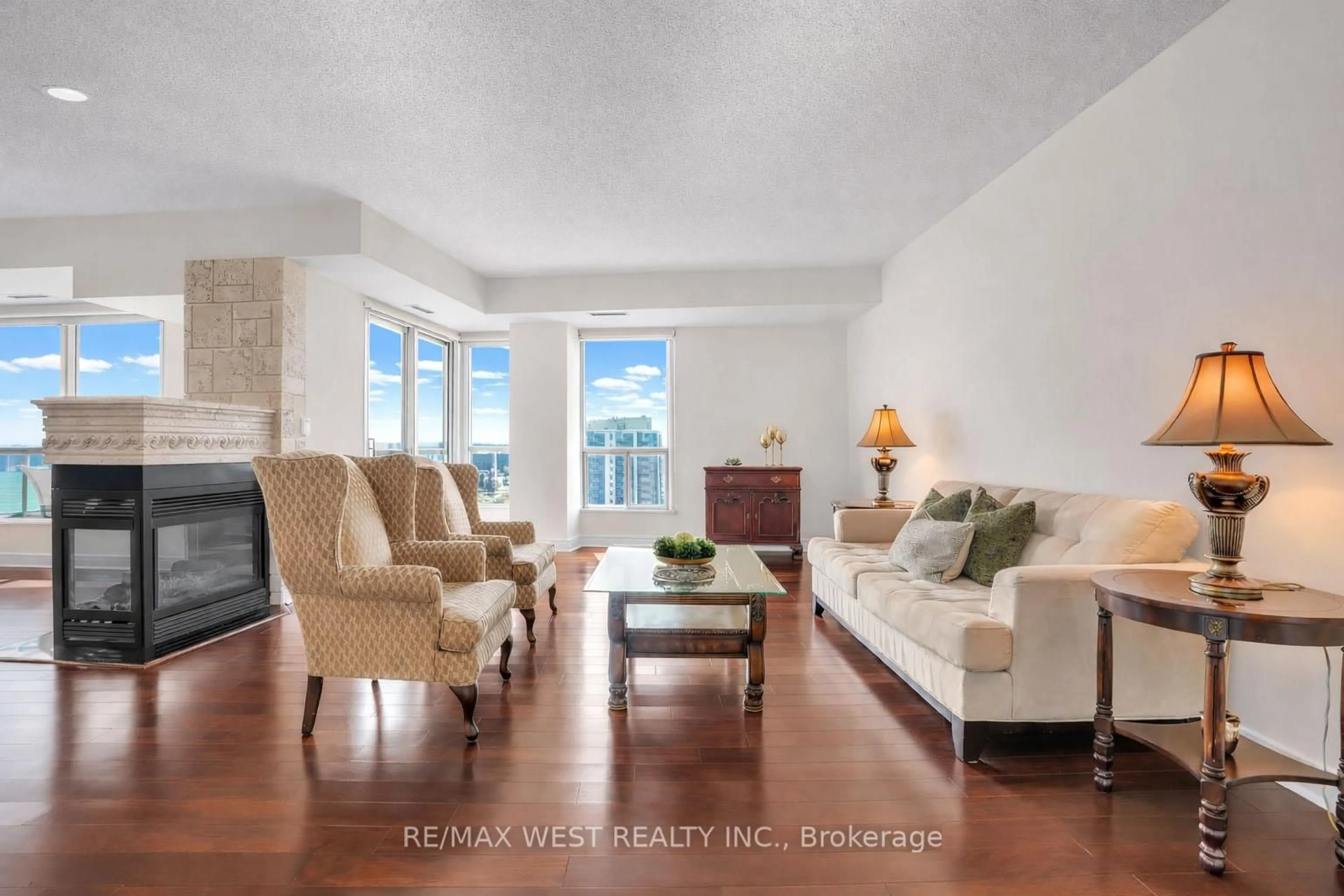 Living room with furniture, ceramic/tile floor for 2 Toronto St #PH1 1, Barrie Ontario L4N 9R2