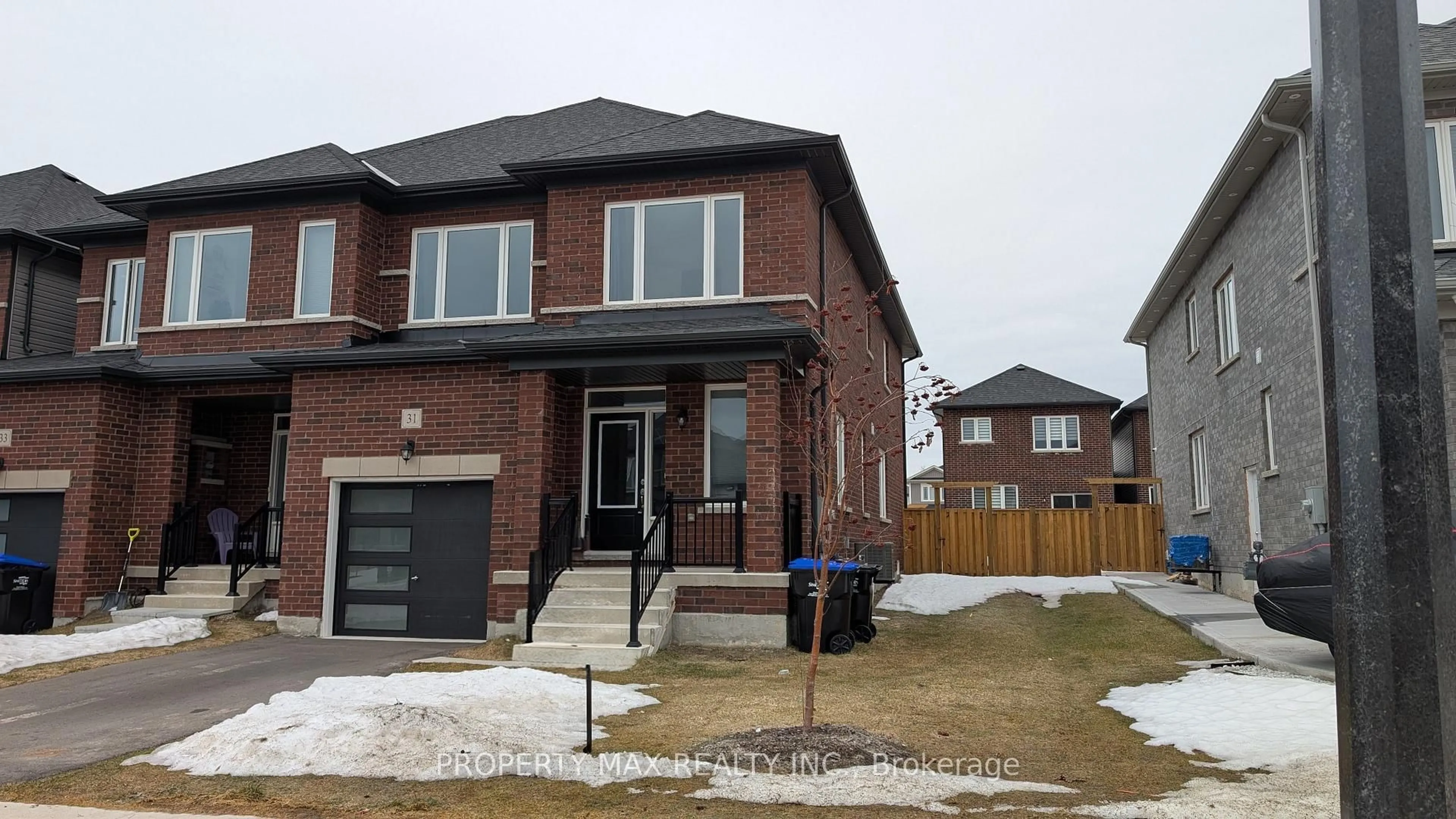 Home with brick exterior material, street for 31 Lisa St, Wasaga Beach Ontario L9Z 1J9