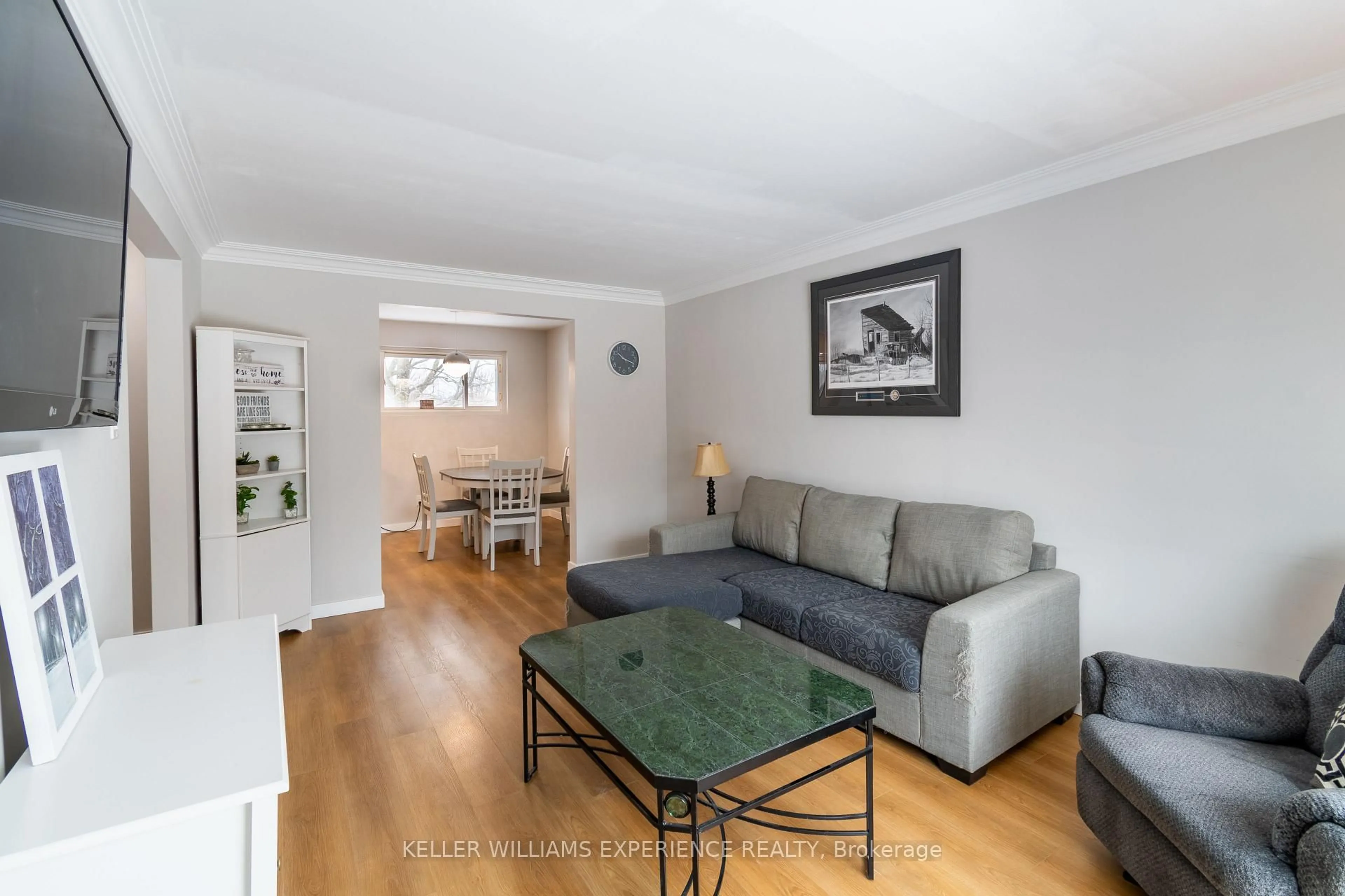 Living room with furniture, wood/laminate floor for 588 Manly St, Midland Ontario L4R 3G3