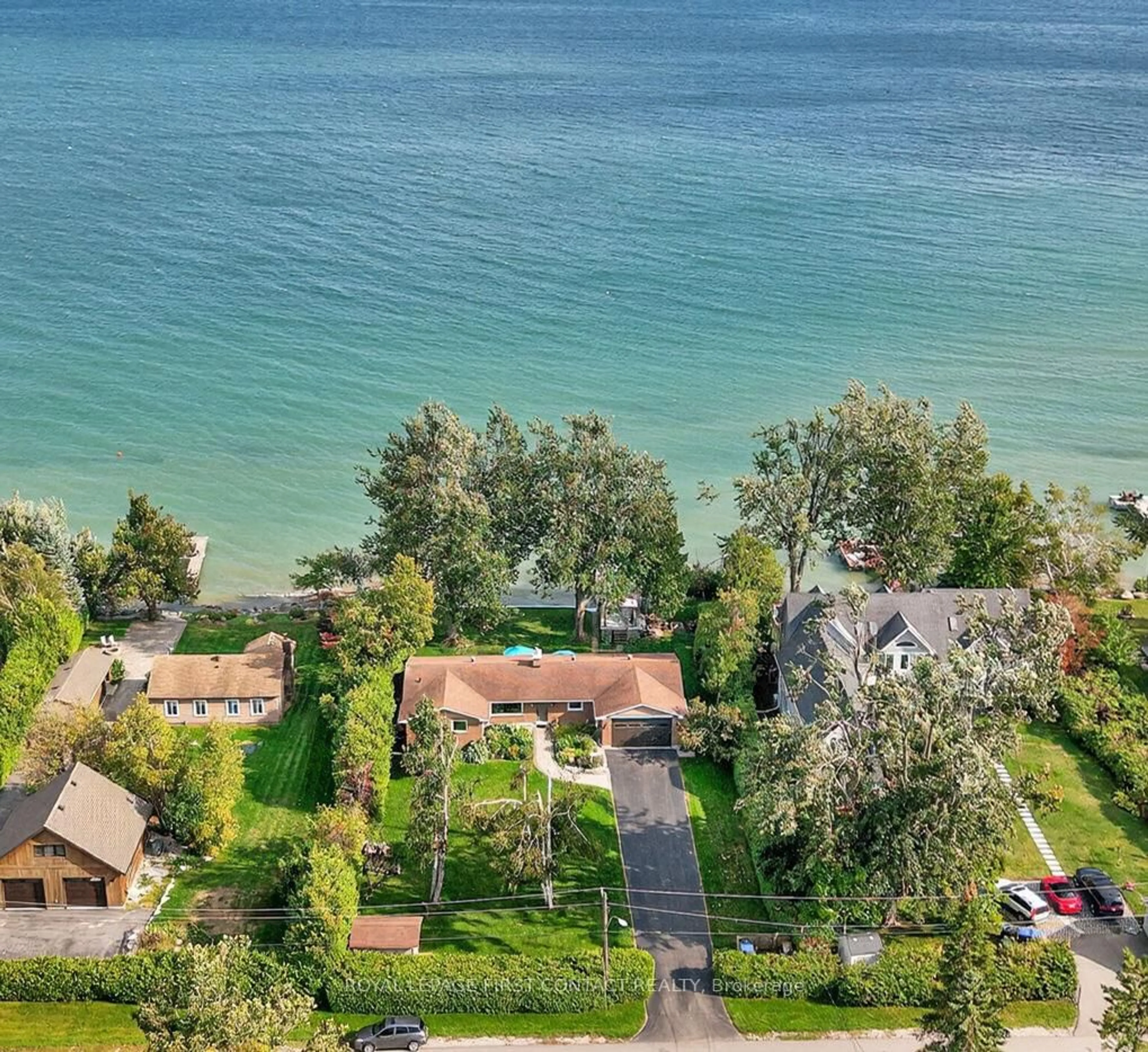 A pic from outside/outdoor area/front of a property/back of a property/a pic from drone, water/lake/river/ocean view for 73 Parkside Dr, Oro-Medonte Ontario L0L 1T0