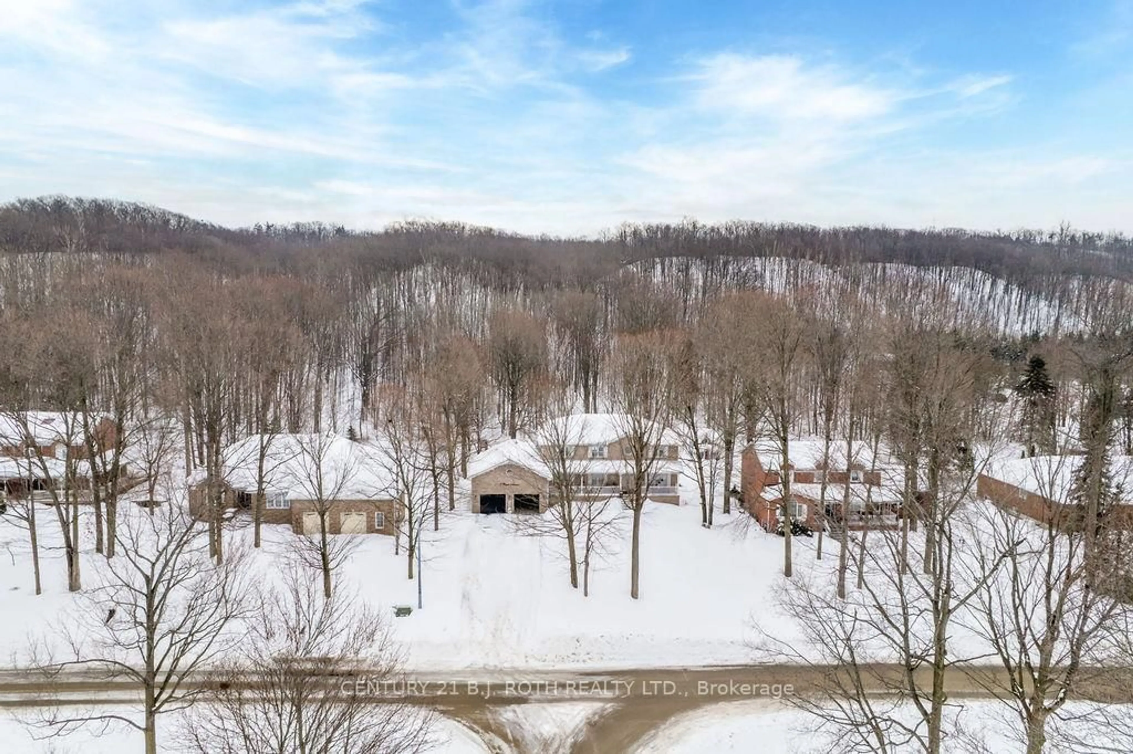 A pic from outside/outdoor area/front of a property/back of a property/a pic from drone, forest/trees view for 7 Priest Ave, Springwater Ontario L9X 0G9