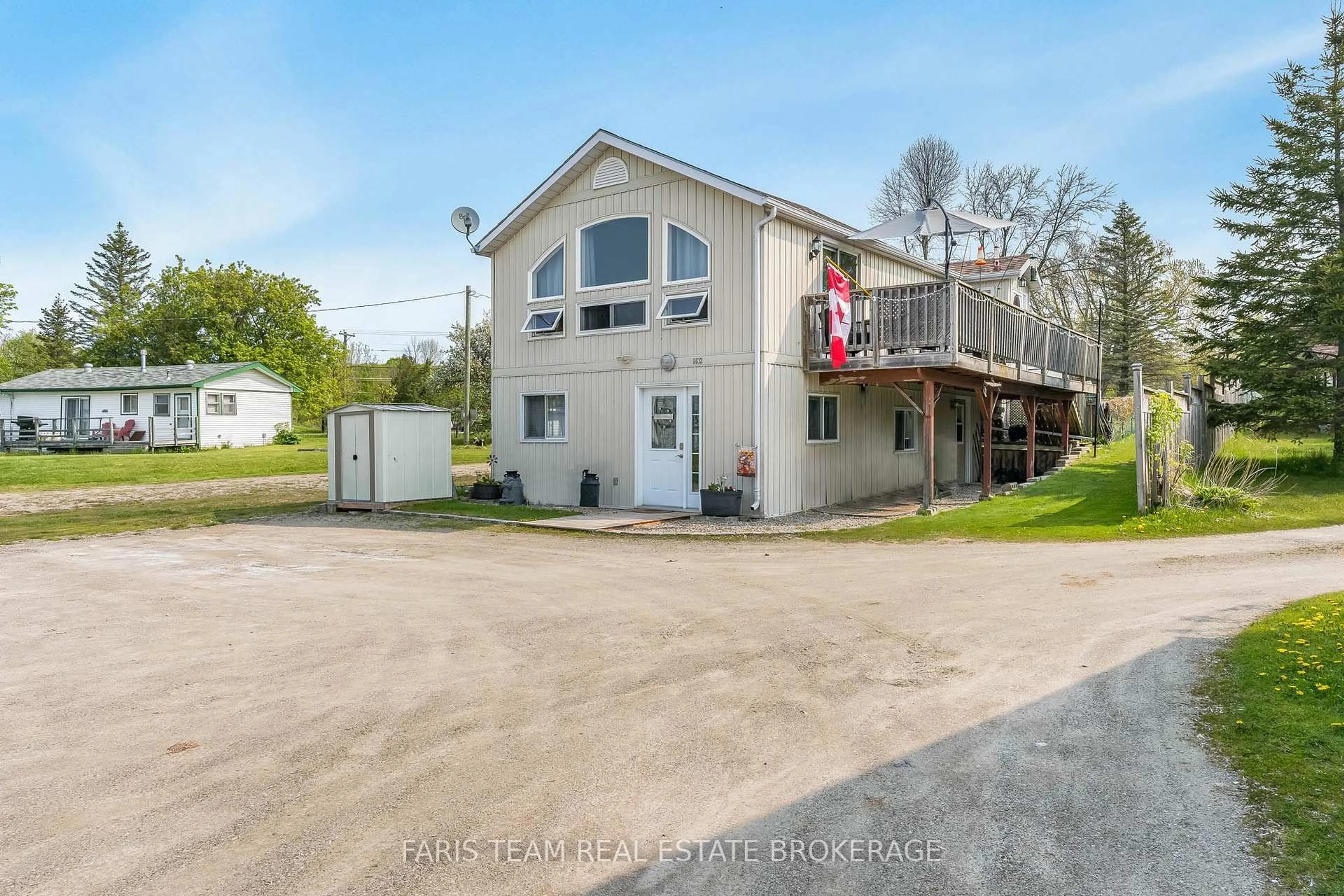 A pic from outside/outdoor area/front of a property/back of a property/a pic from drone, unknown for 5632 Penetanguishene Rd, Springwater Ontario L0L 1P0