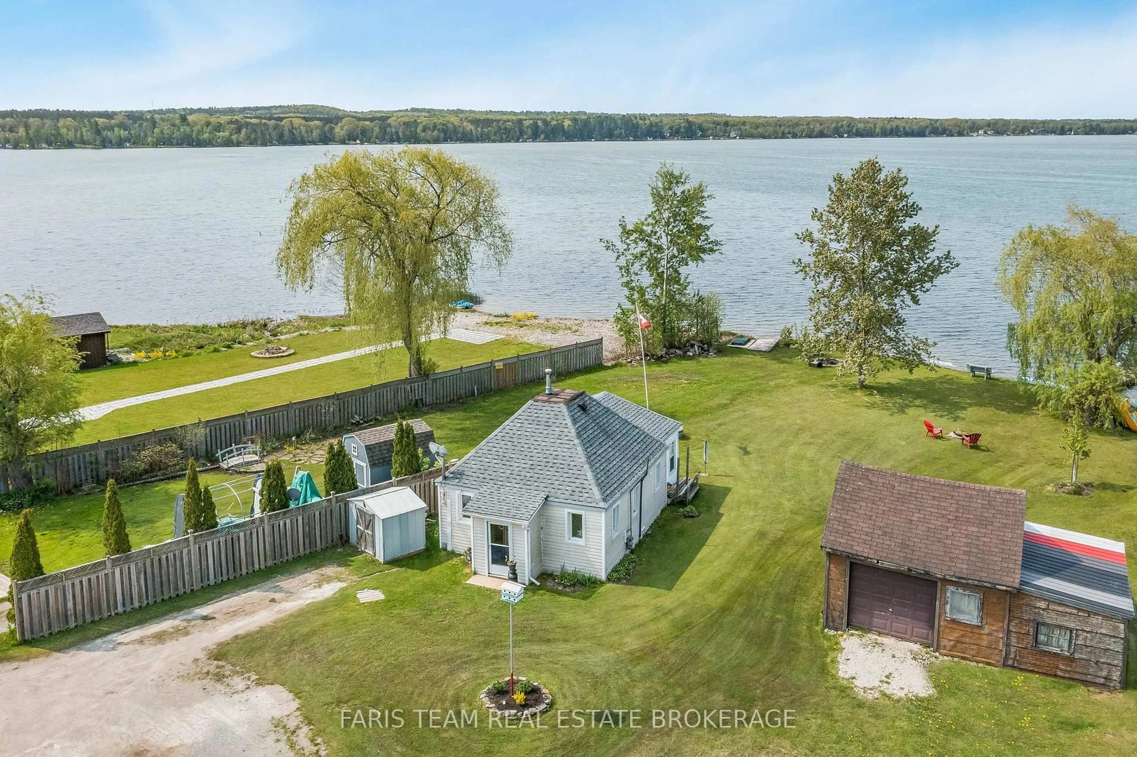 A pic from outside/outdoor area/front of a property/back of a property/a pic from drone, water/lake/river/ocean view for 5632 Penetanguishene Rd, Springwater Ontario L0L 1P0