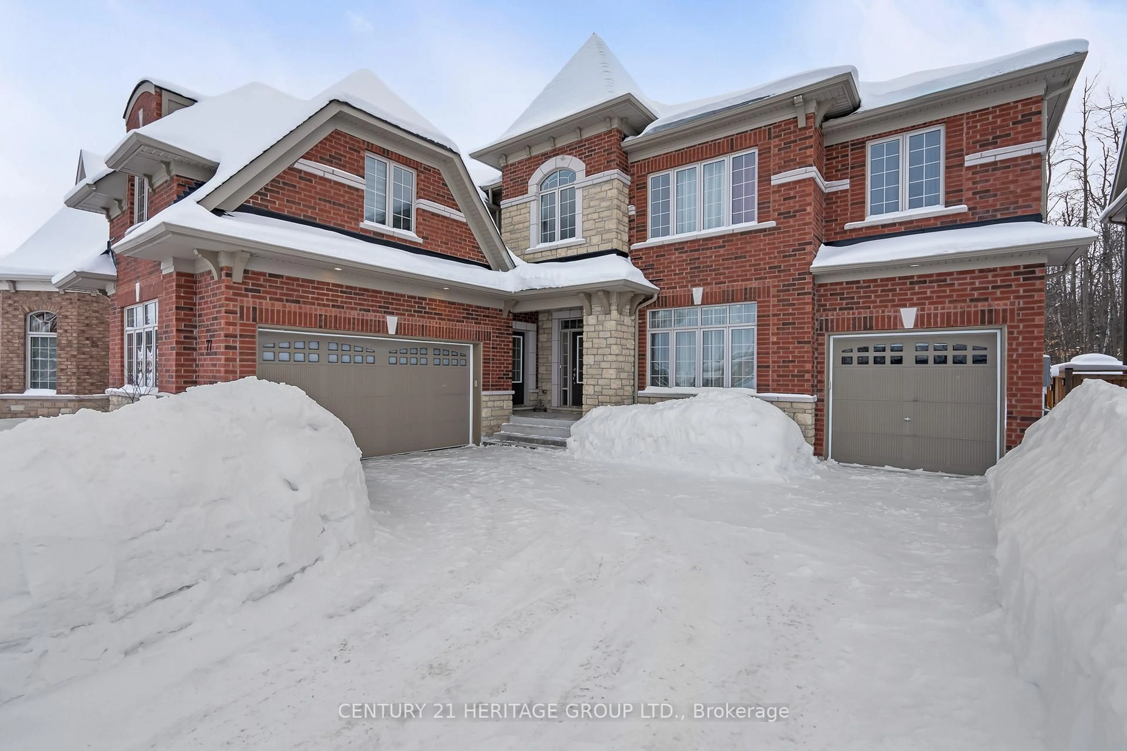 Home with brick exterior material, street for 77 Trail Blvd, Springwater Ontario L9X 0S3