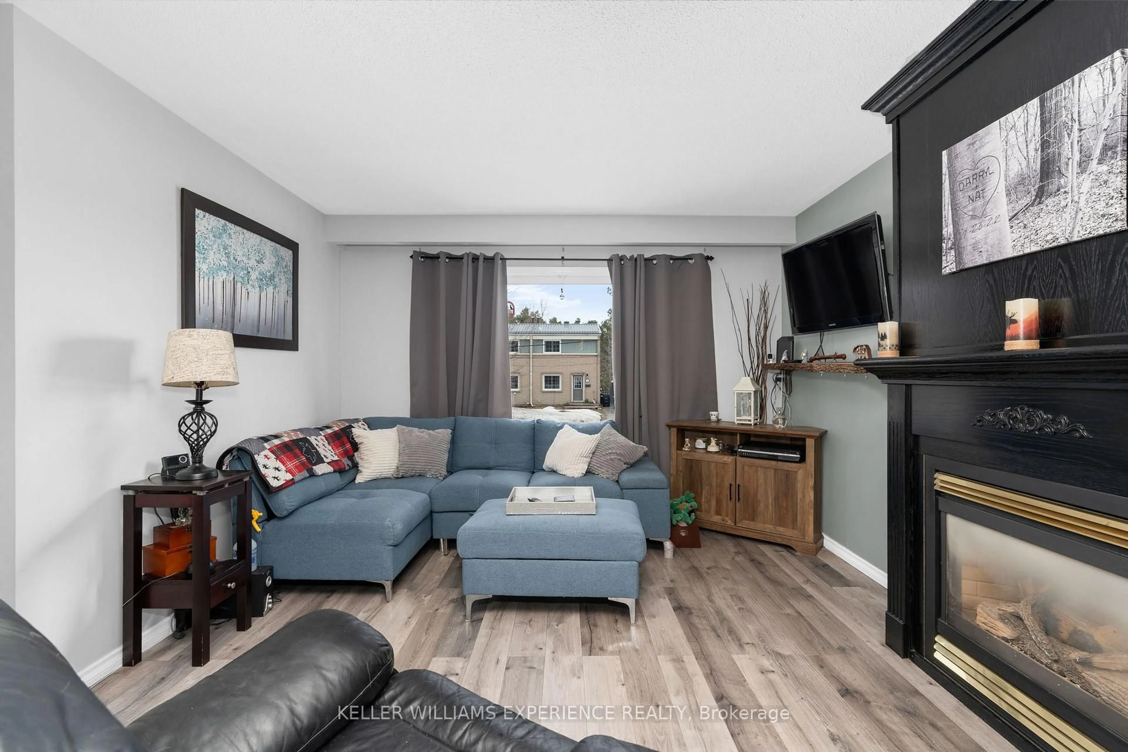 Living room with furniture, unknown for 16 John St #A, Penetanguishene Ontario L9M 1N8