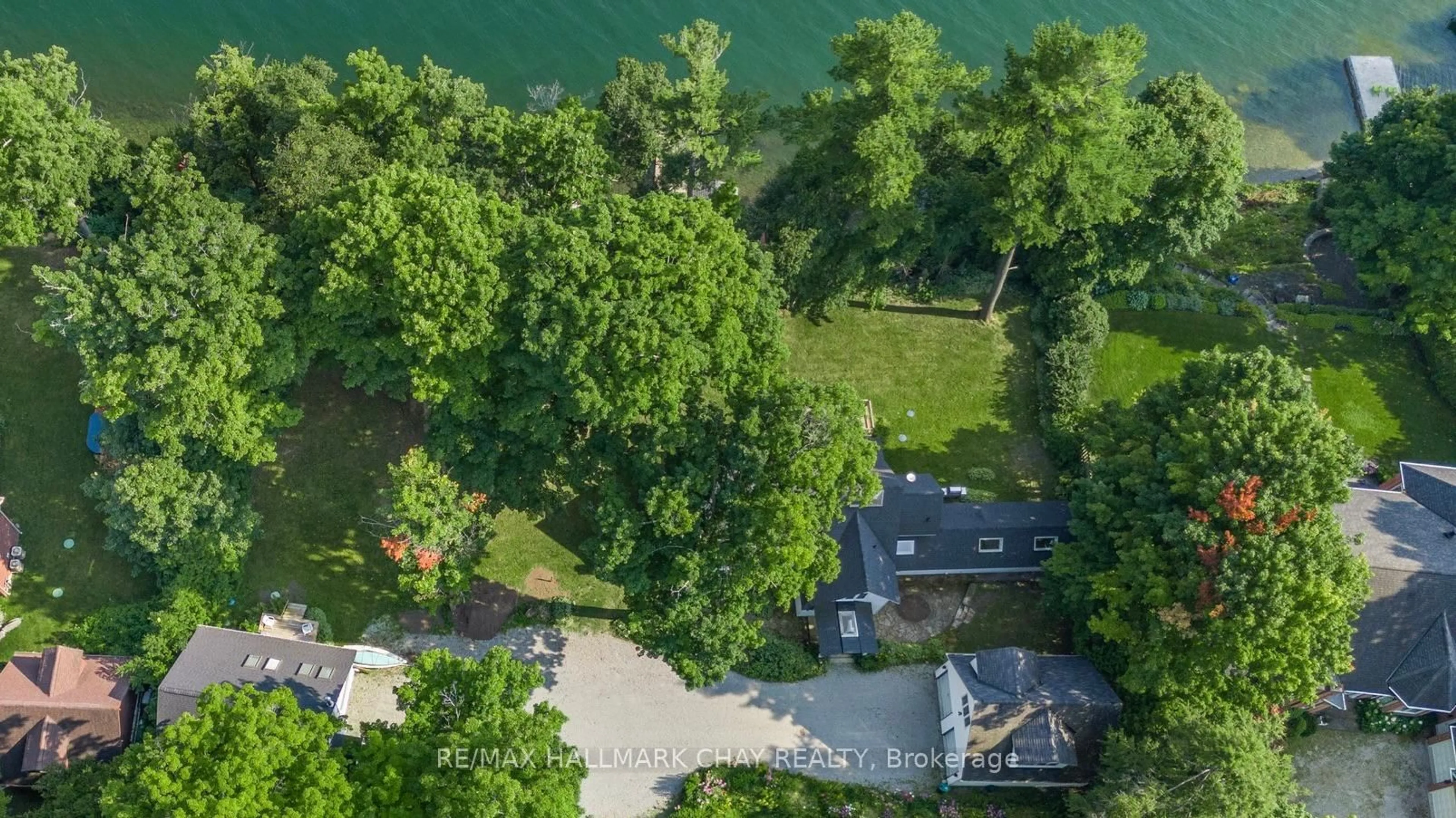 A pic from outside/outdoor area/front of a property/back of a property/a pic from drone, water/lake/river/ocean view for 209 Bay St, Oro-Medonte Ontario L0L 2L0