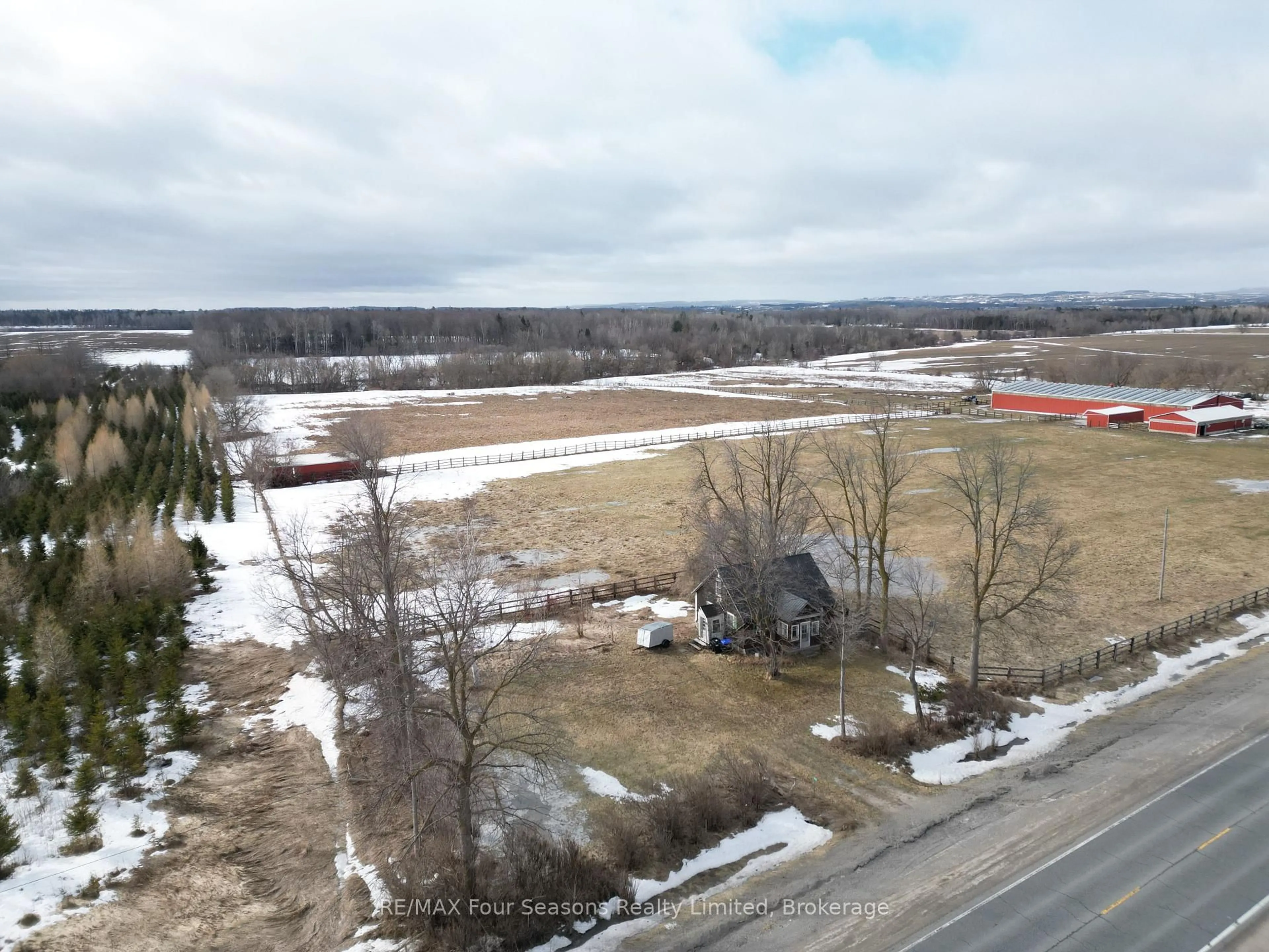 A pic from outside/outdoor area/front of a property/back of a property/a pic from drone, mountain view for 6677 Highway 26, Clearview Ontario L0M 1S0