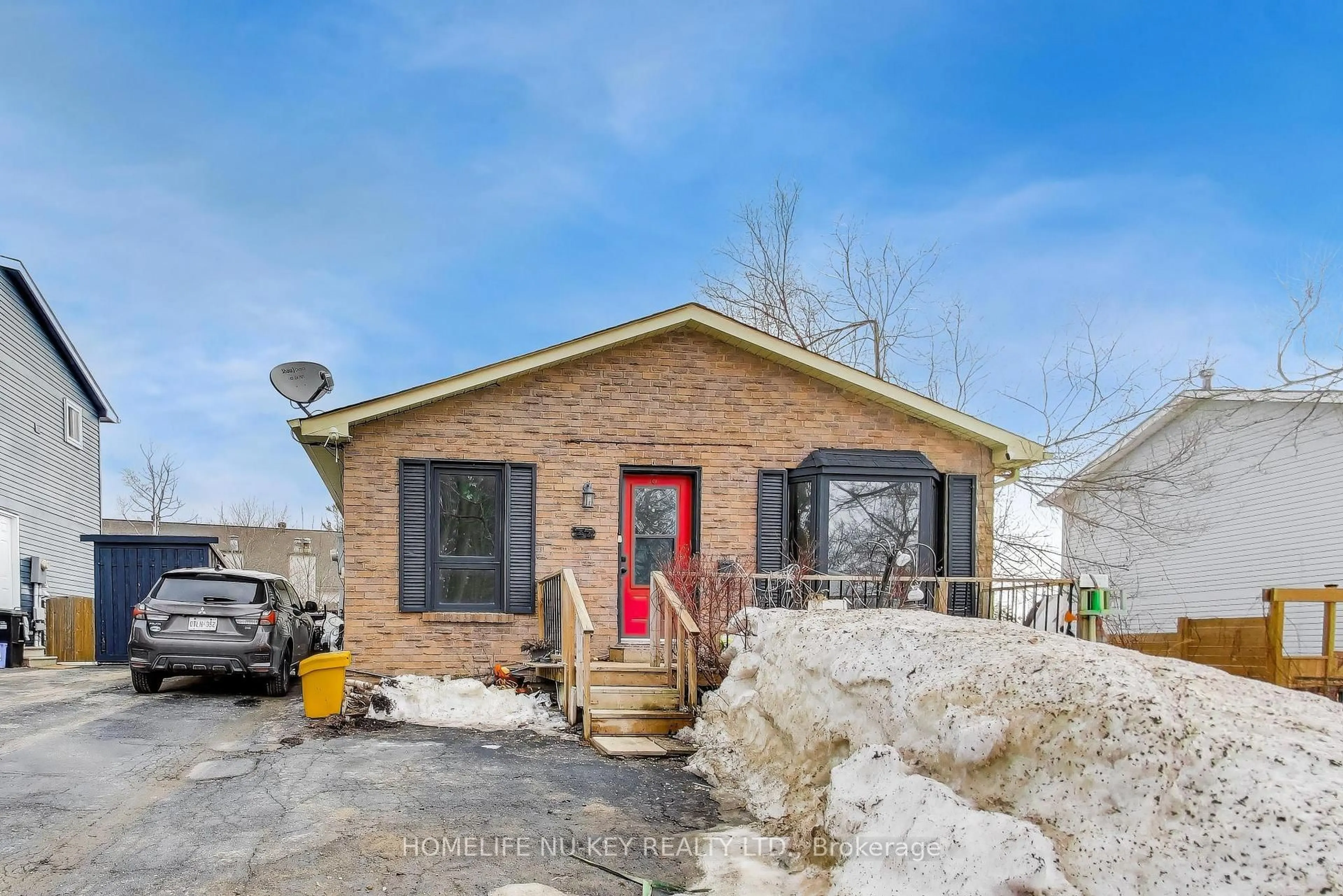 Home with brick exterior material, street for 77 Frost Tr, Barrie Ontario L4N 4Z8