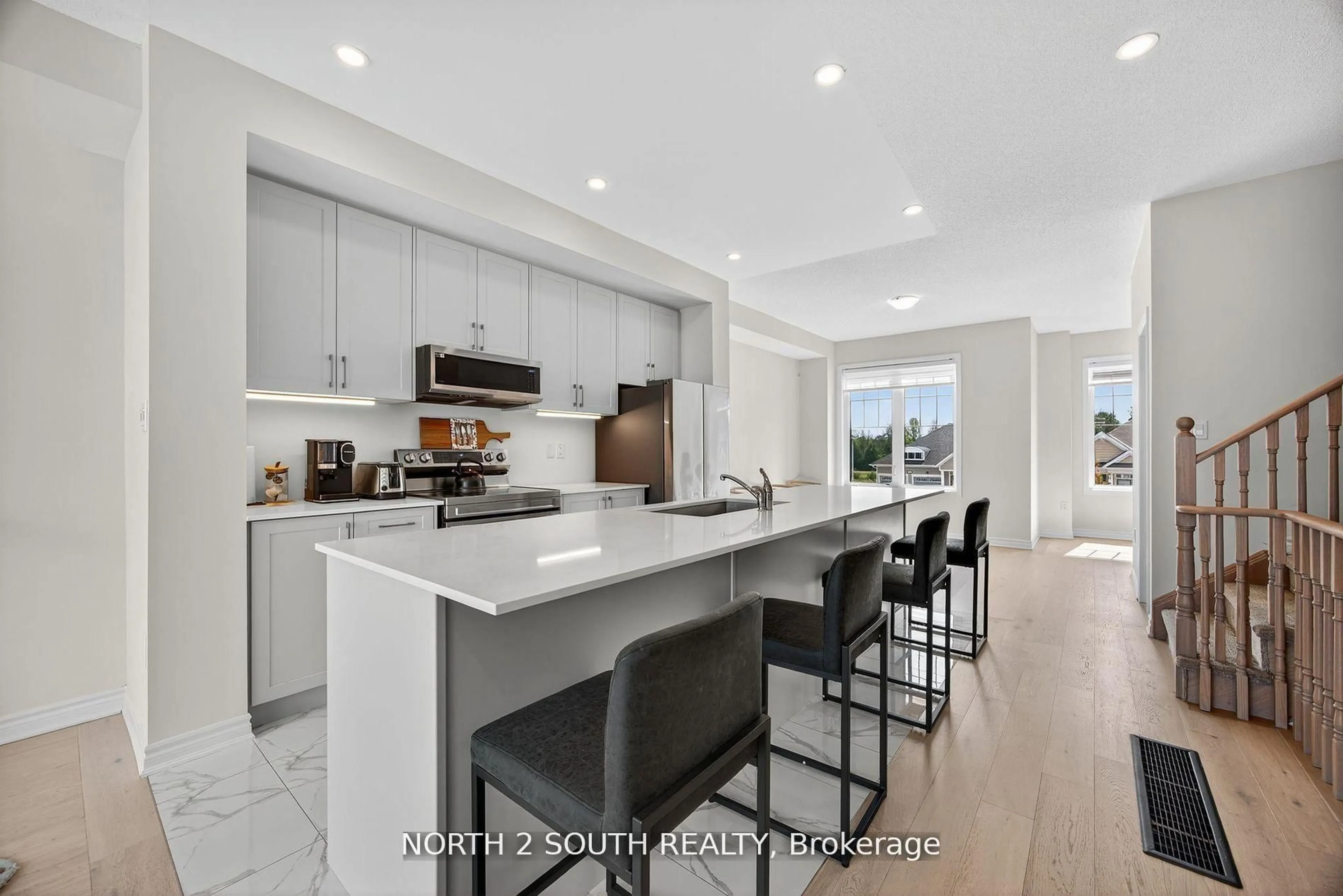 Open concept kitchen, ceramic/tile floor for 24 Abby Dr, Wasaga Beach Ontario L9Z 0K2