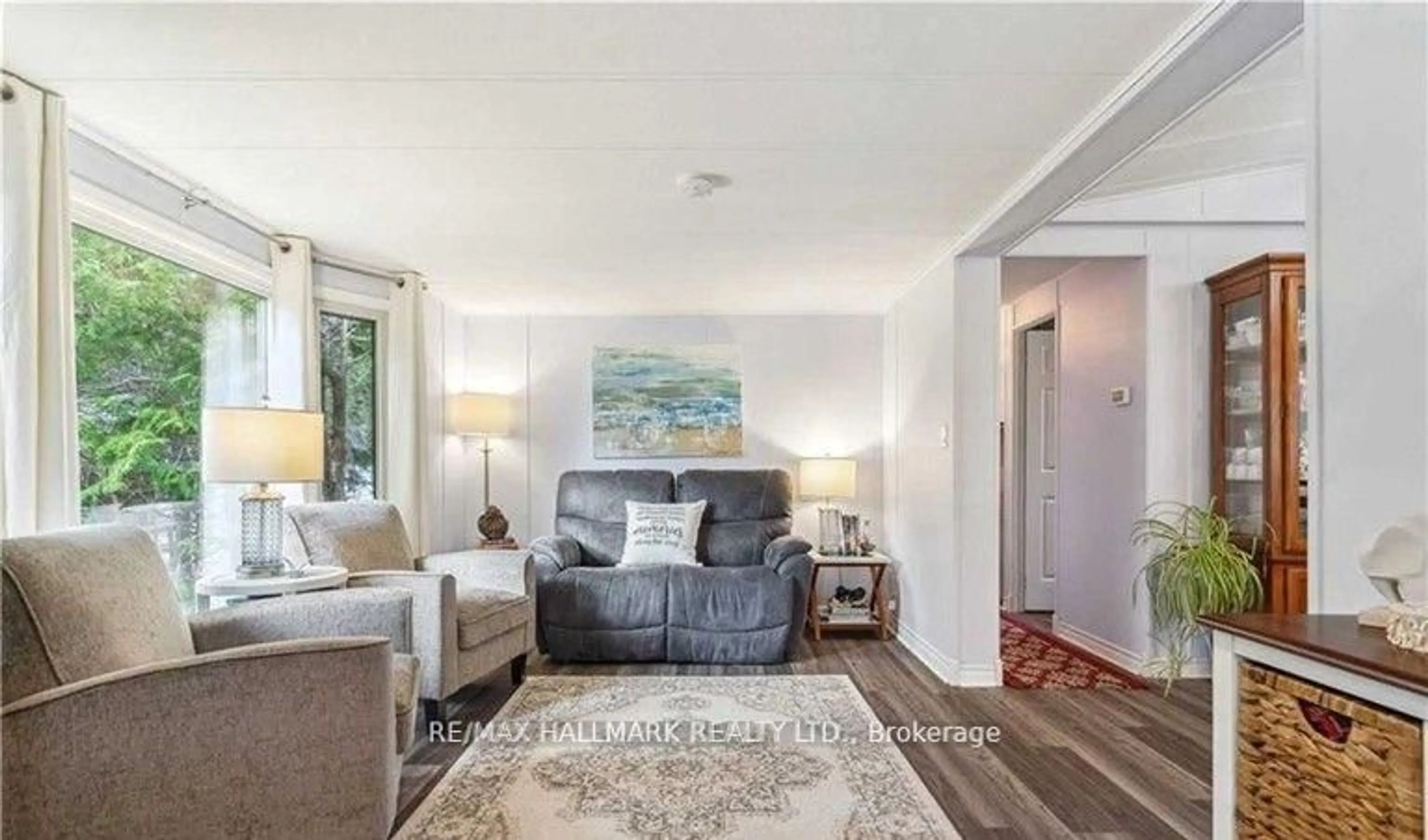 Living room with furniture, unknown for 6 Prince Charles Ave, Springwater Ontario L0L 1P0