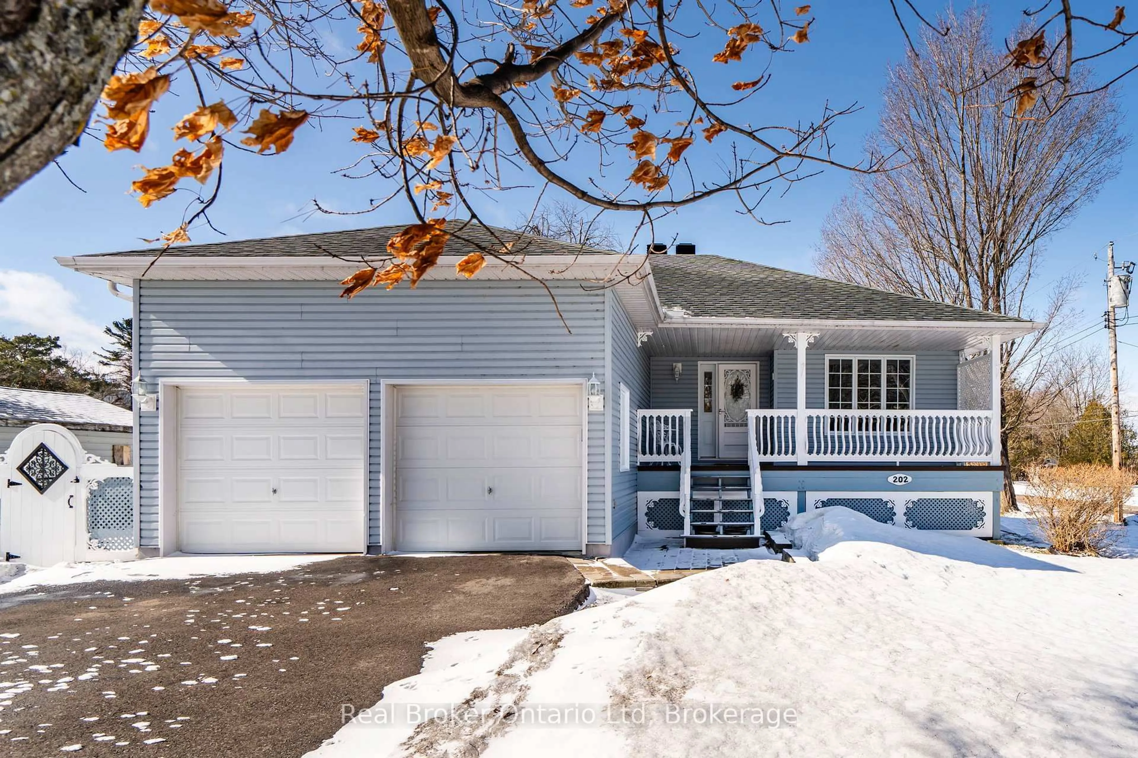 Home with vinyl exterior material, street for 202 Ouida St, Tay Ontario L0K 2C0