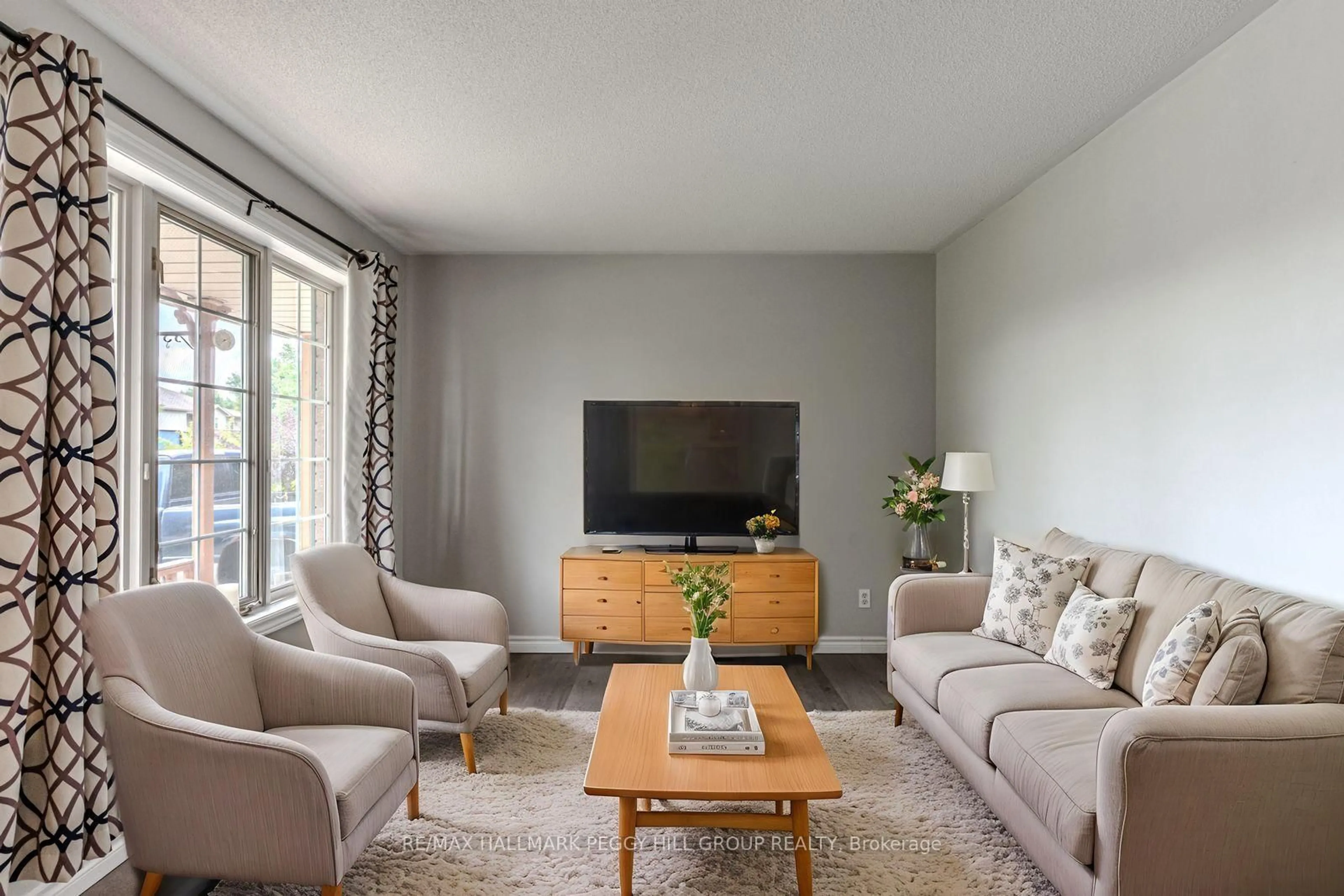 Living room with furniture, unknown for 55 Marlow Circ, Springwater Ontario L0L 1V0