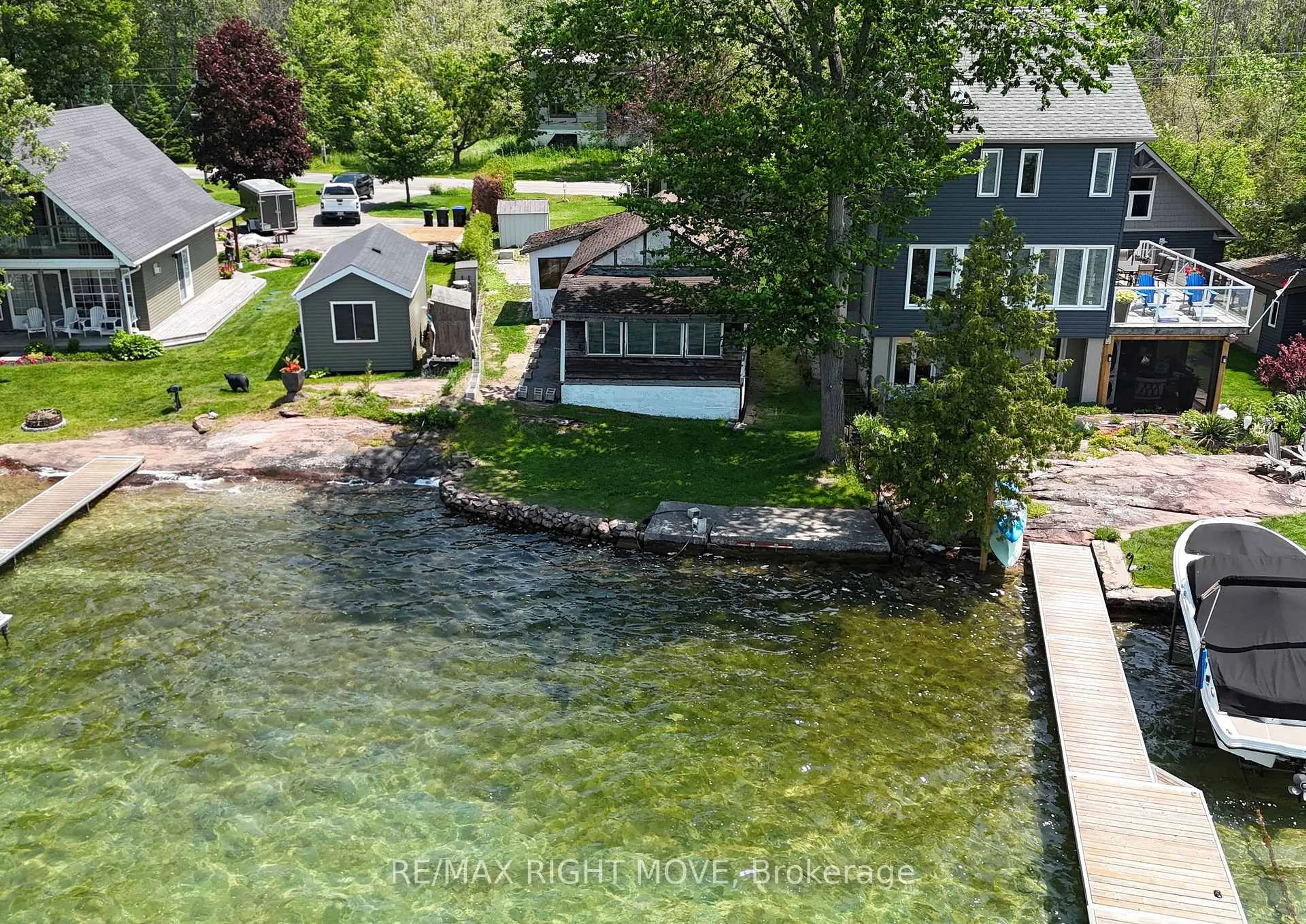 A pic from outside/outdoor area/front of a property/back of a property/a pic from drone, water/lake/river/ocean view for 7682 Oak Point Rd, Ramara Ontario L0K 2B0
