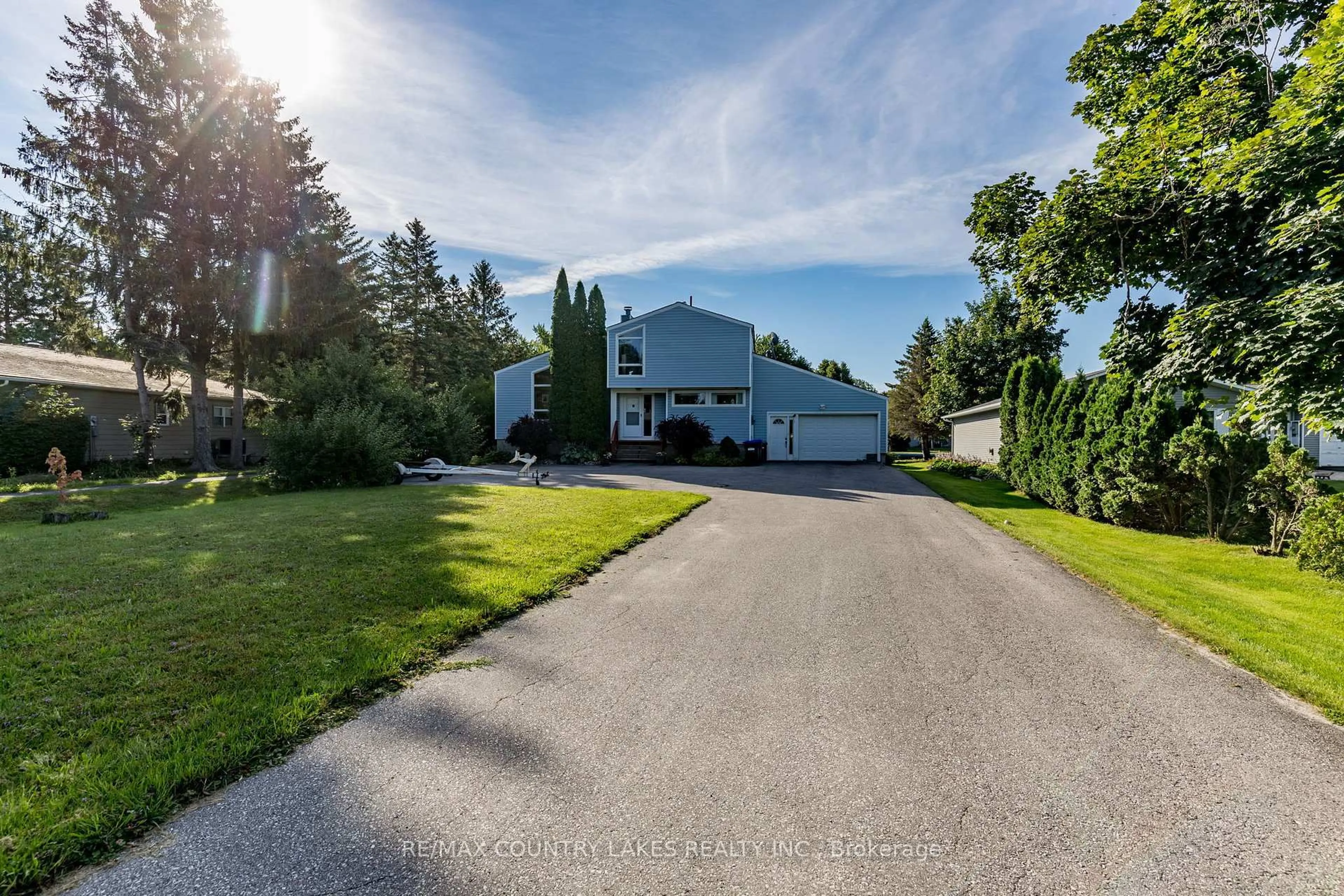 A pic from outside/outdoor area/front of a property/back of a property/a pic from drone, street for 52 Turtle Path, Ramara Ontario L0K 1B0