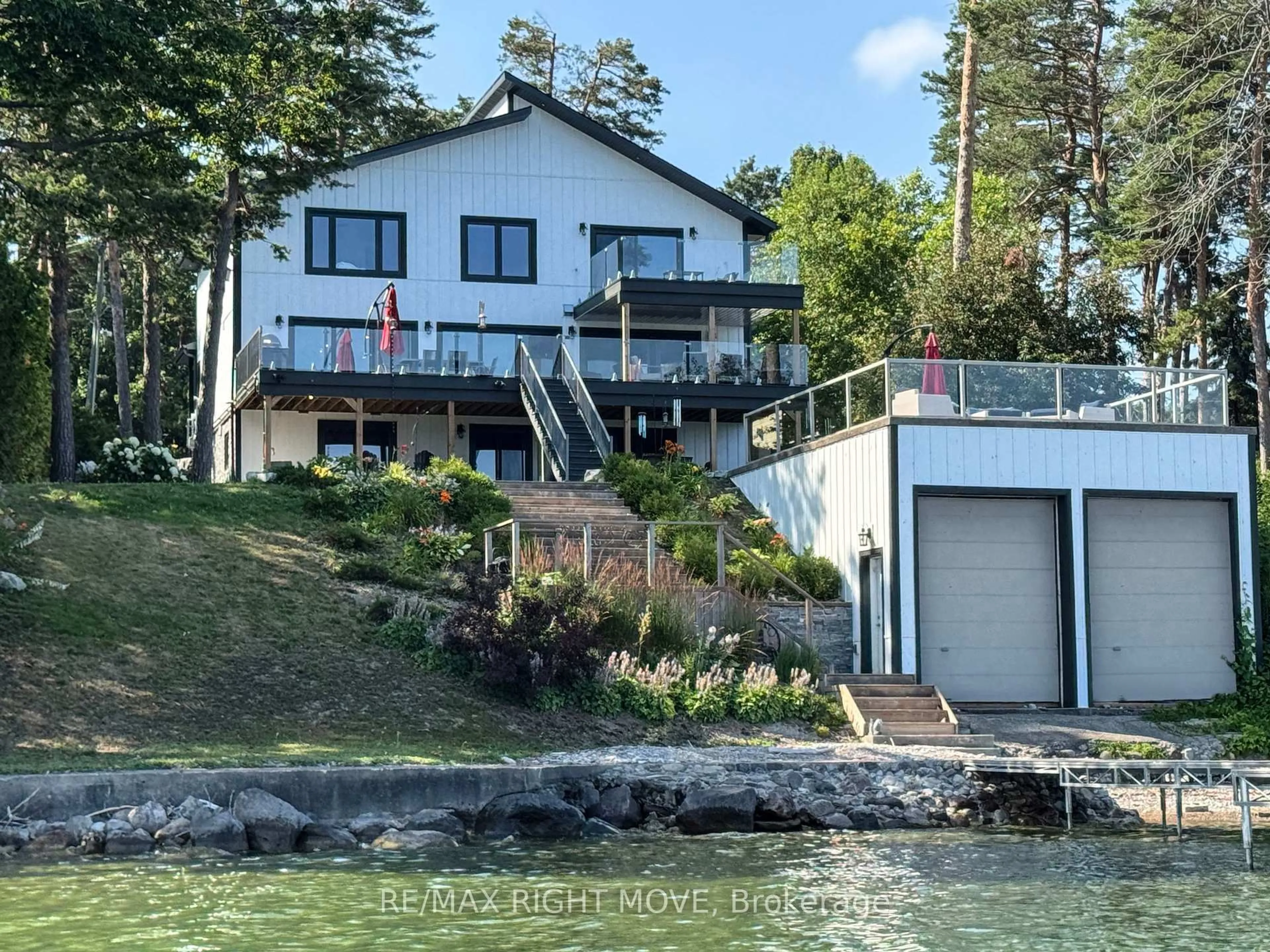 A pic from outside/outdoor area/front of a property/back of a property/a pic from drone, water/lake/river/ocean view for 1189 Woodland Dr, Oro-Medonte Ontario L3V 0R8