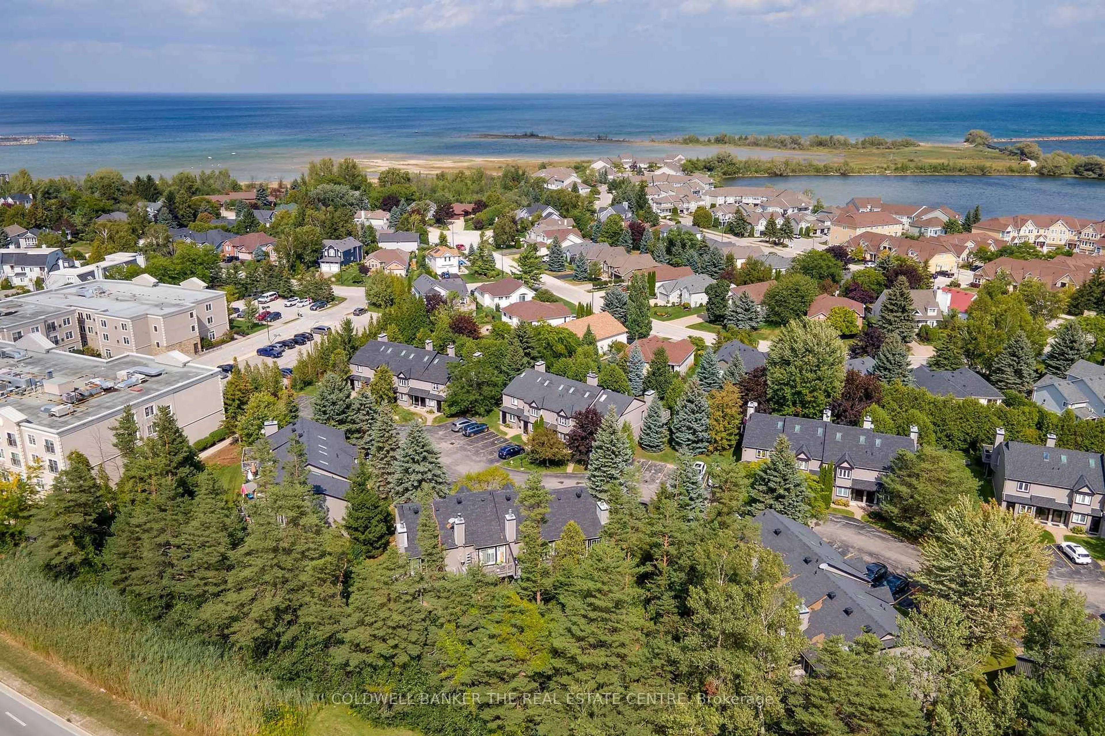 A pic from outside/outdoor area/front of a property/back of a property/a pic from drone, water/lake/river/ocean view for 5 Harbour St #27, Collingwood Ontario L9Y 5C5