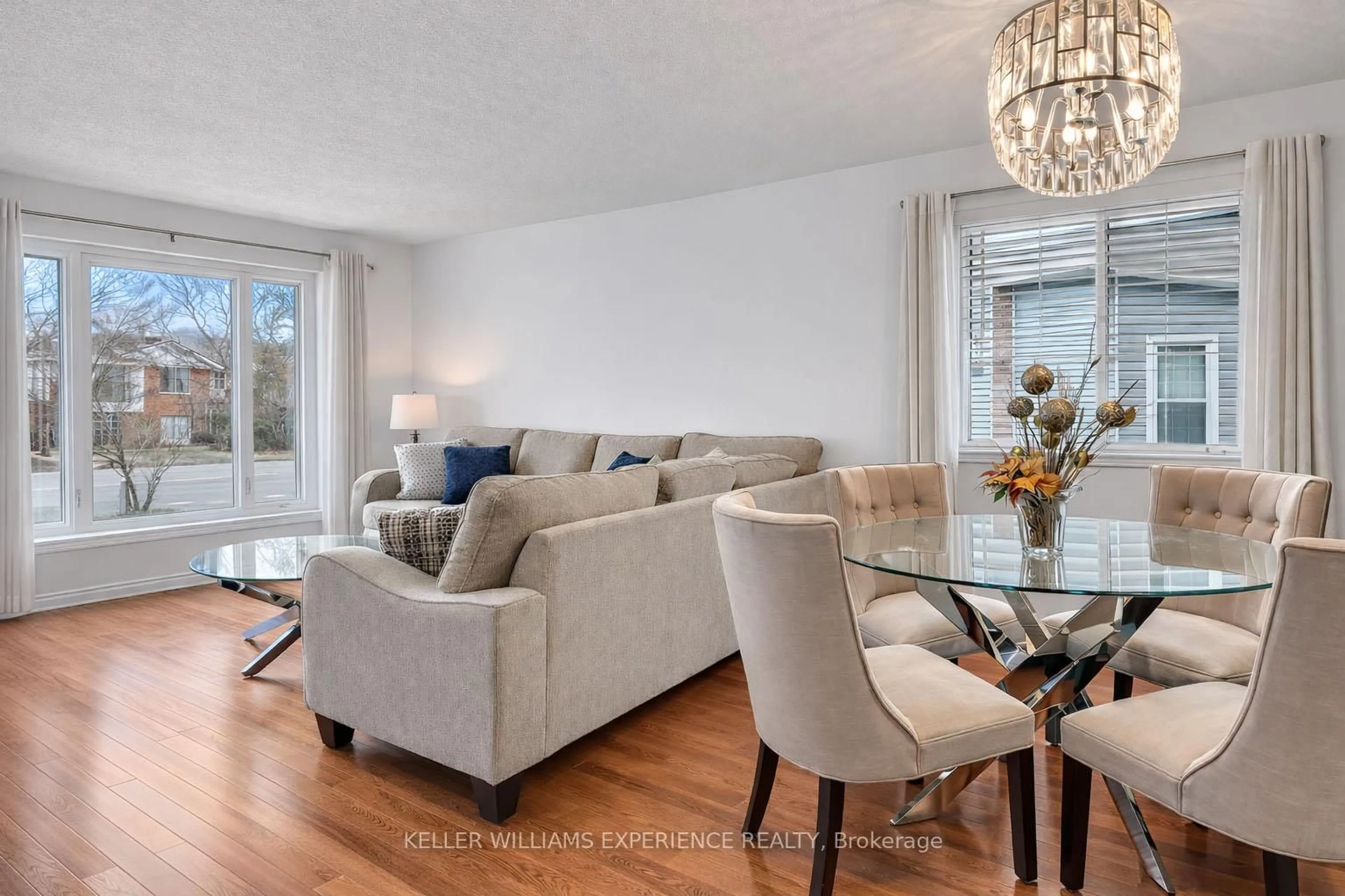 Living room with furniture, wood/laminate floor for 21 Knicely Rd, Barrie Ontario L4N 6V3