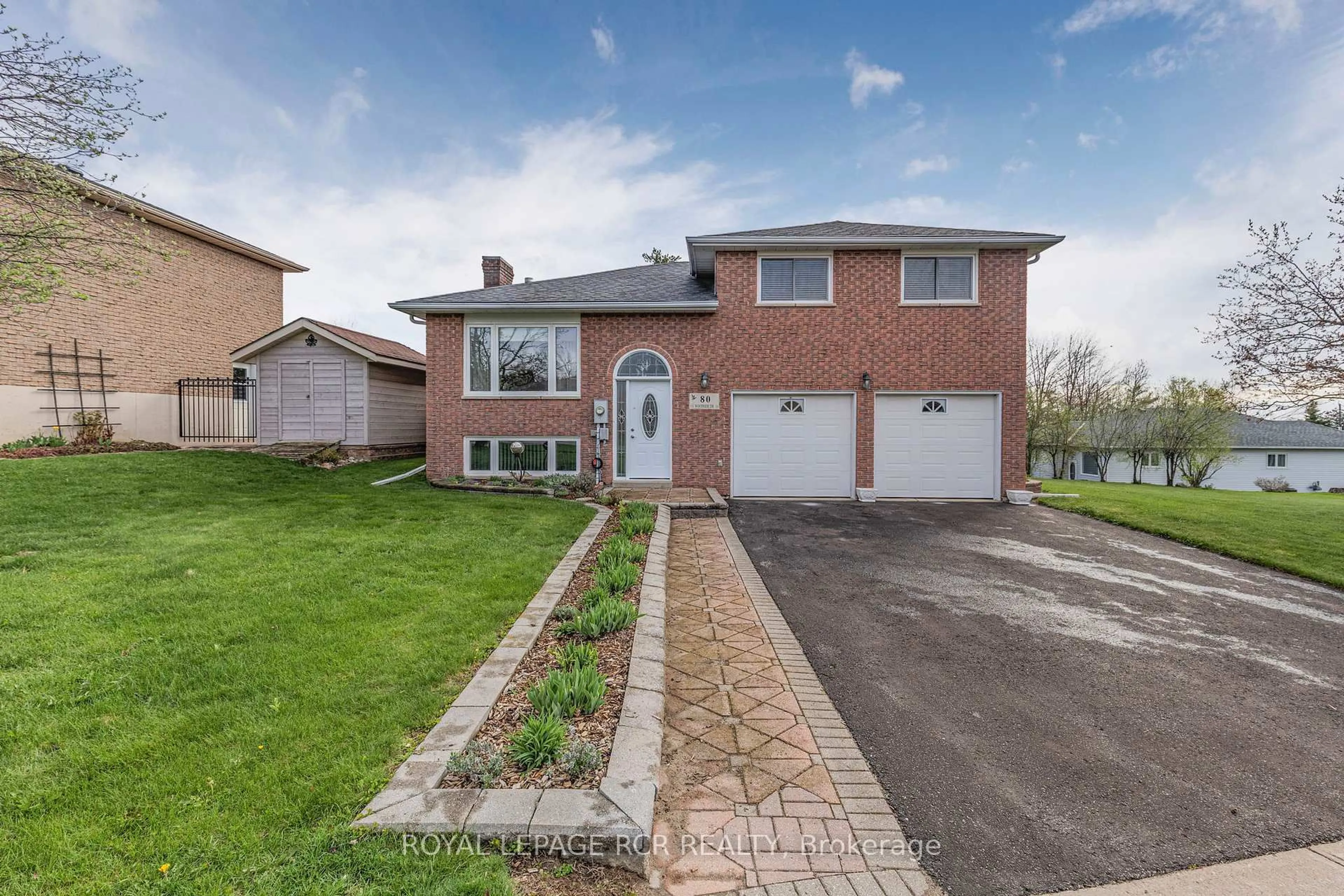 Home with brick exterior material, street for 80 Woodside Dr, Orillia Ontario L3V 7N9