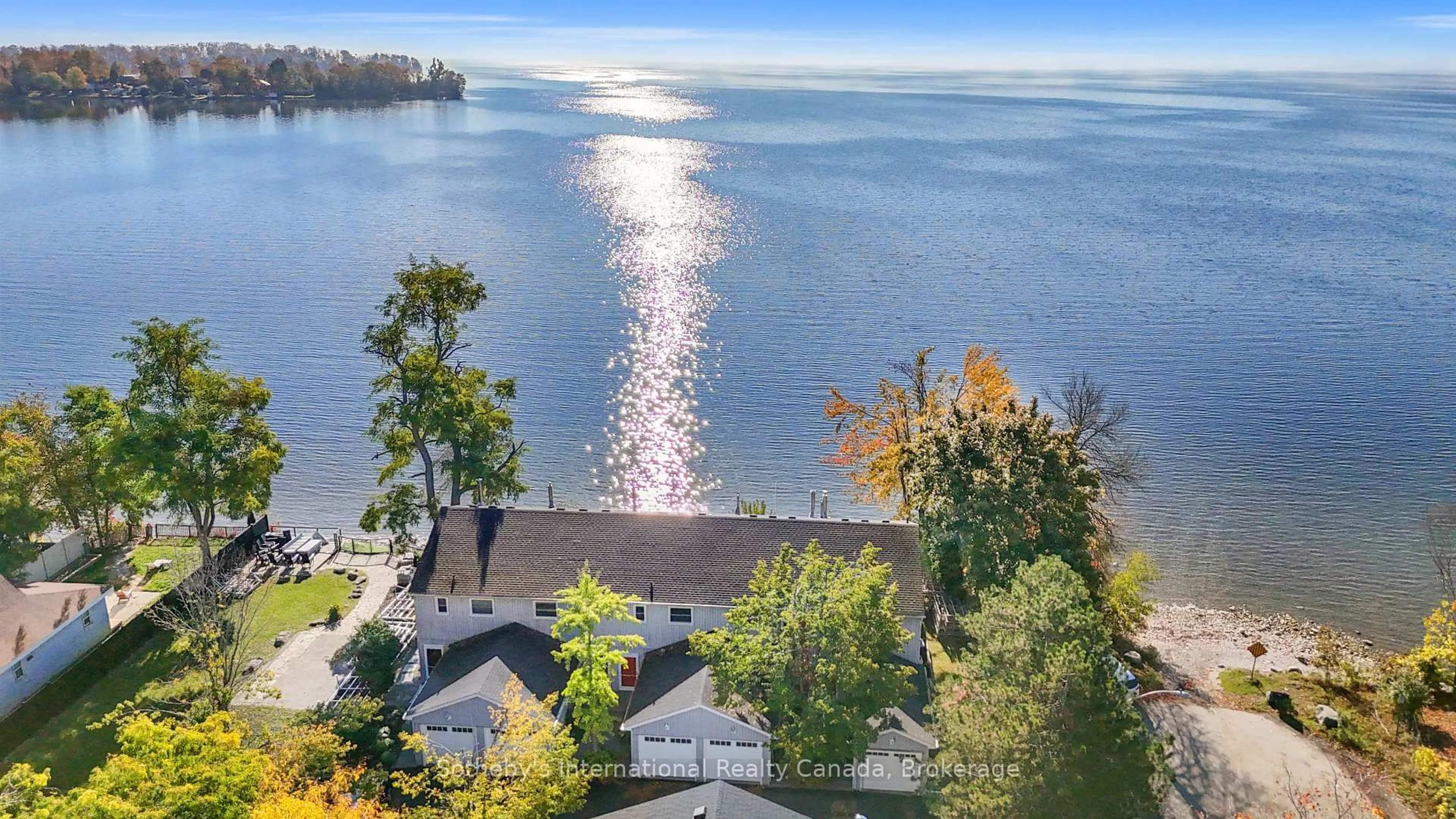 A pic from outside/outdoor area/front of a property/back of a property/a pic from drone, water/lake/river/ocean view for 1 Olive Cres #5, Orillia Ontario L3V 7N5