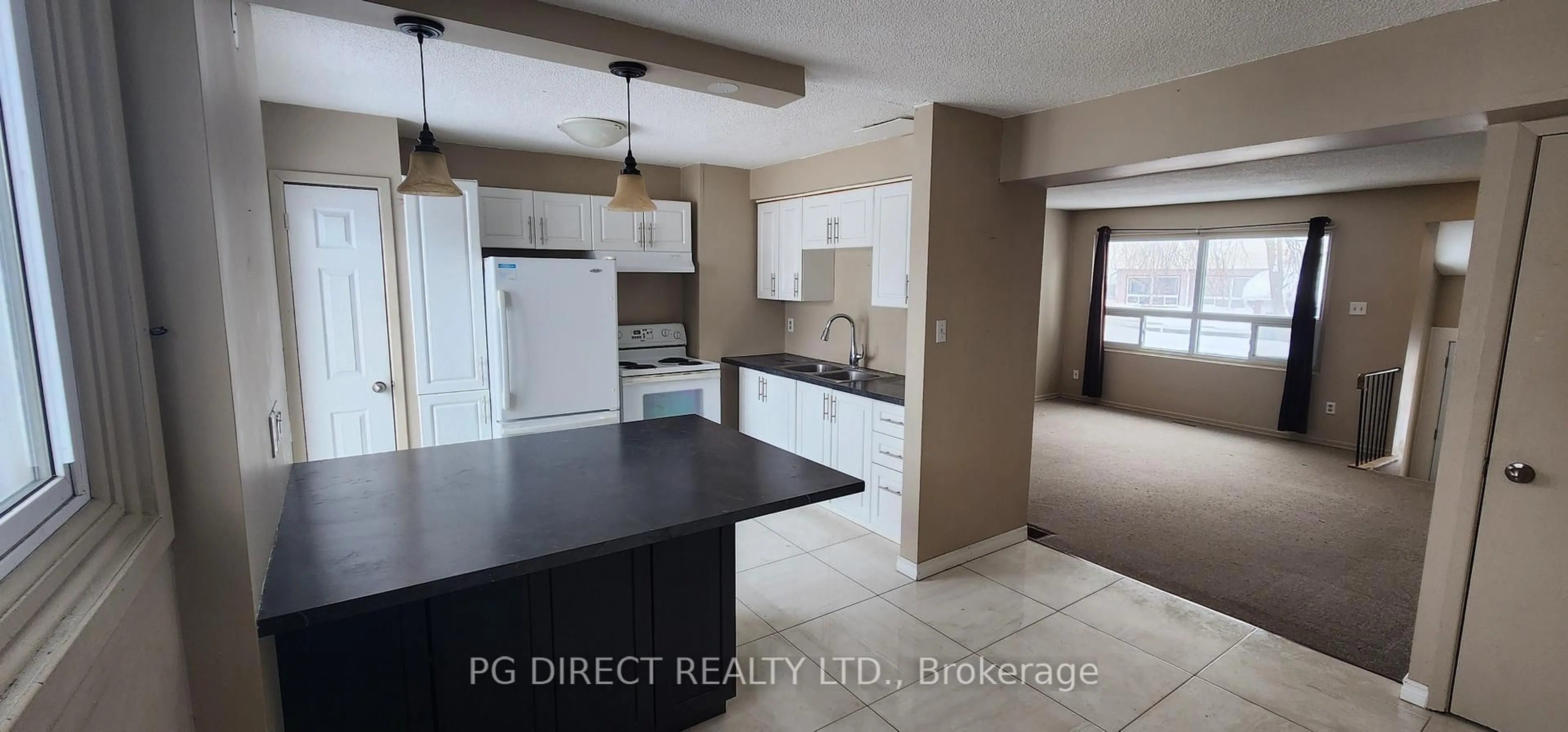 Open concept kitchen, ceramic/tile floor for 63 Ferris Lane #L10, Barrie Ontario L4M 5C4