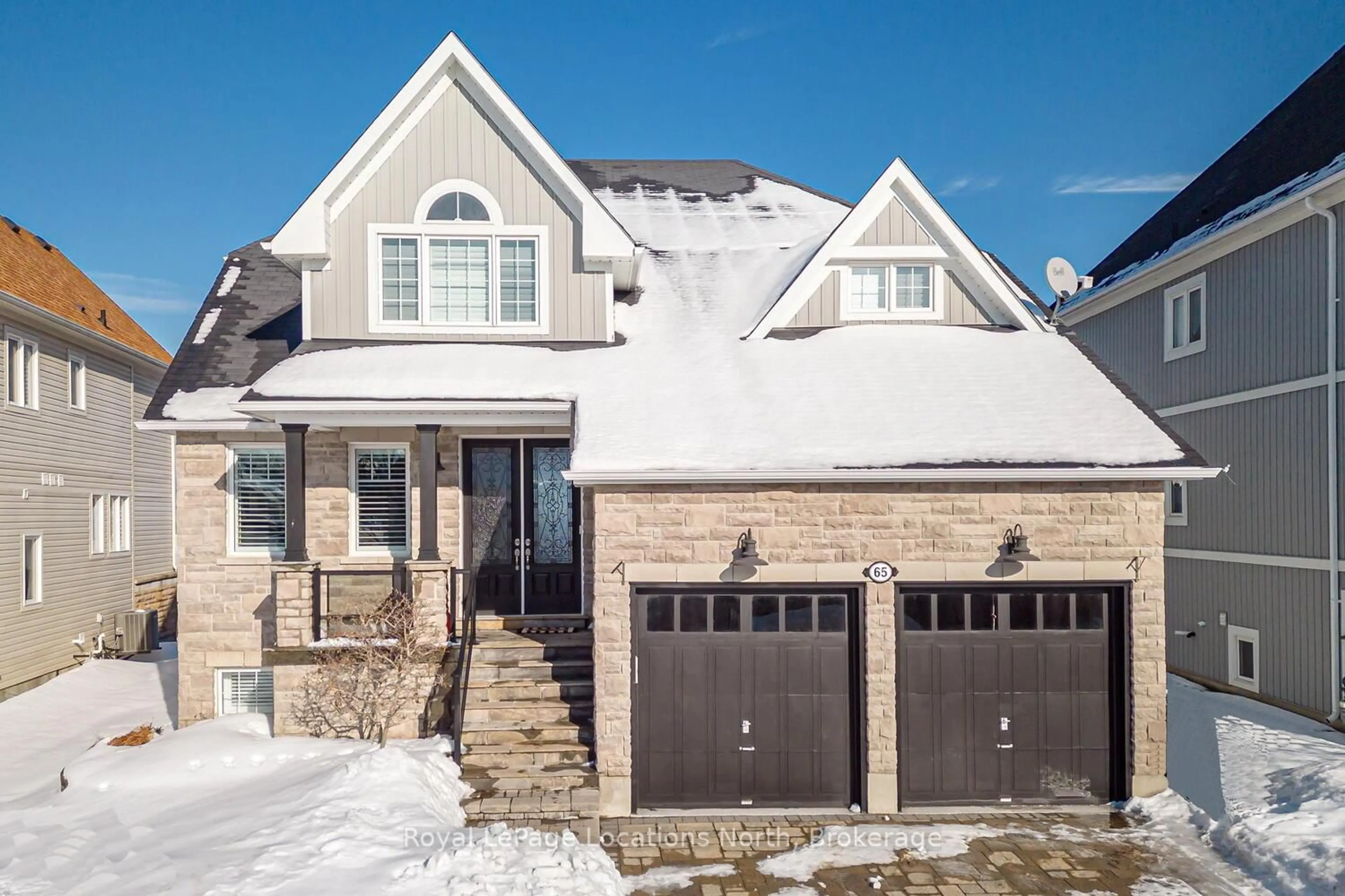 Home with brick exterior material, street for 65 Waterview Rd, Wasaga Beach Ontario L9Z 0E9