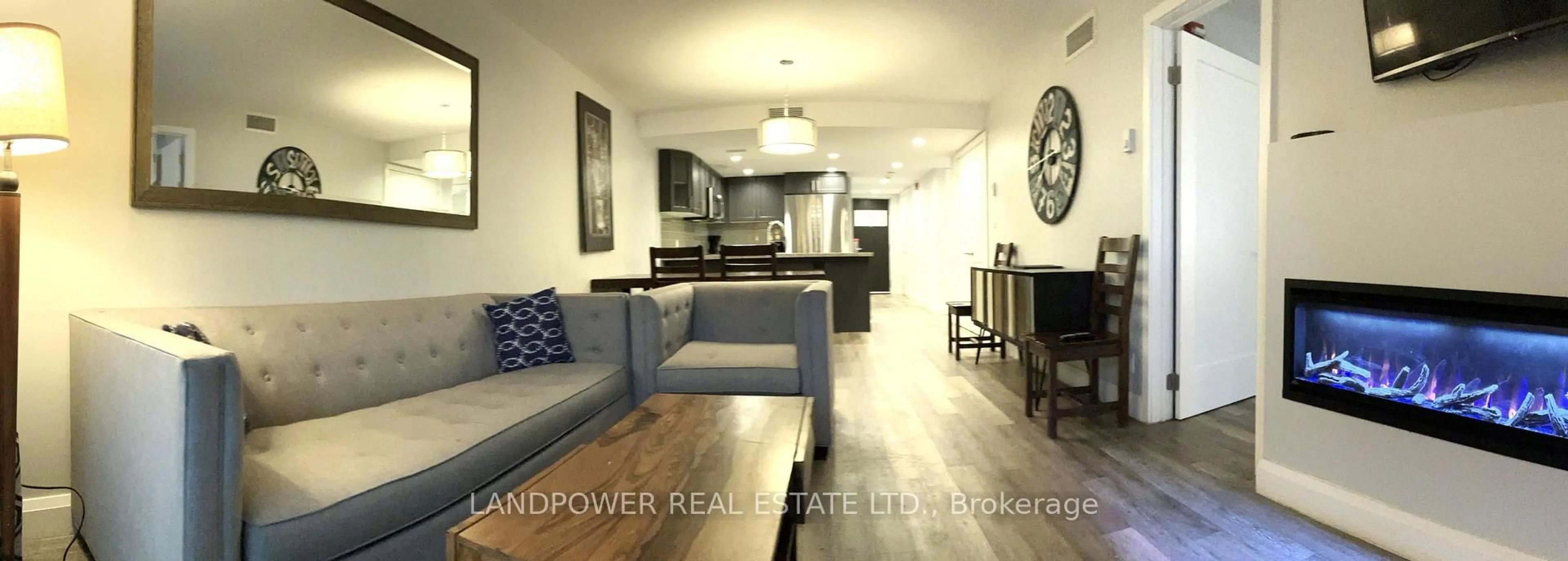 Open concept kitchen, wood/laminate floor for 80 Horseshoe Blvd #101, Oro-Medonte Ontario L4M 4Y8