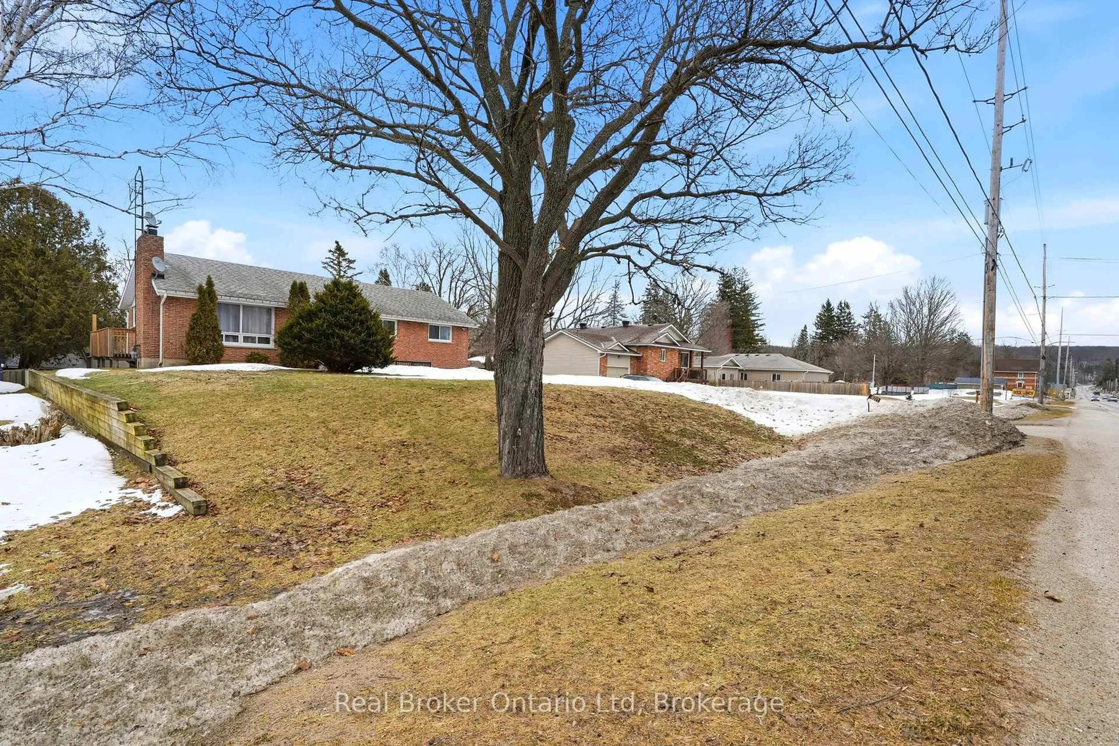 A pic from outside/outdoor area/front of a property/back of a property/a pic from drone, street for 8271 93 Highway, Tiny Ontario L0K 2E1